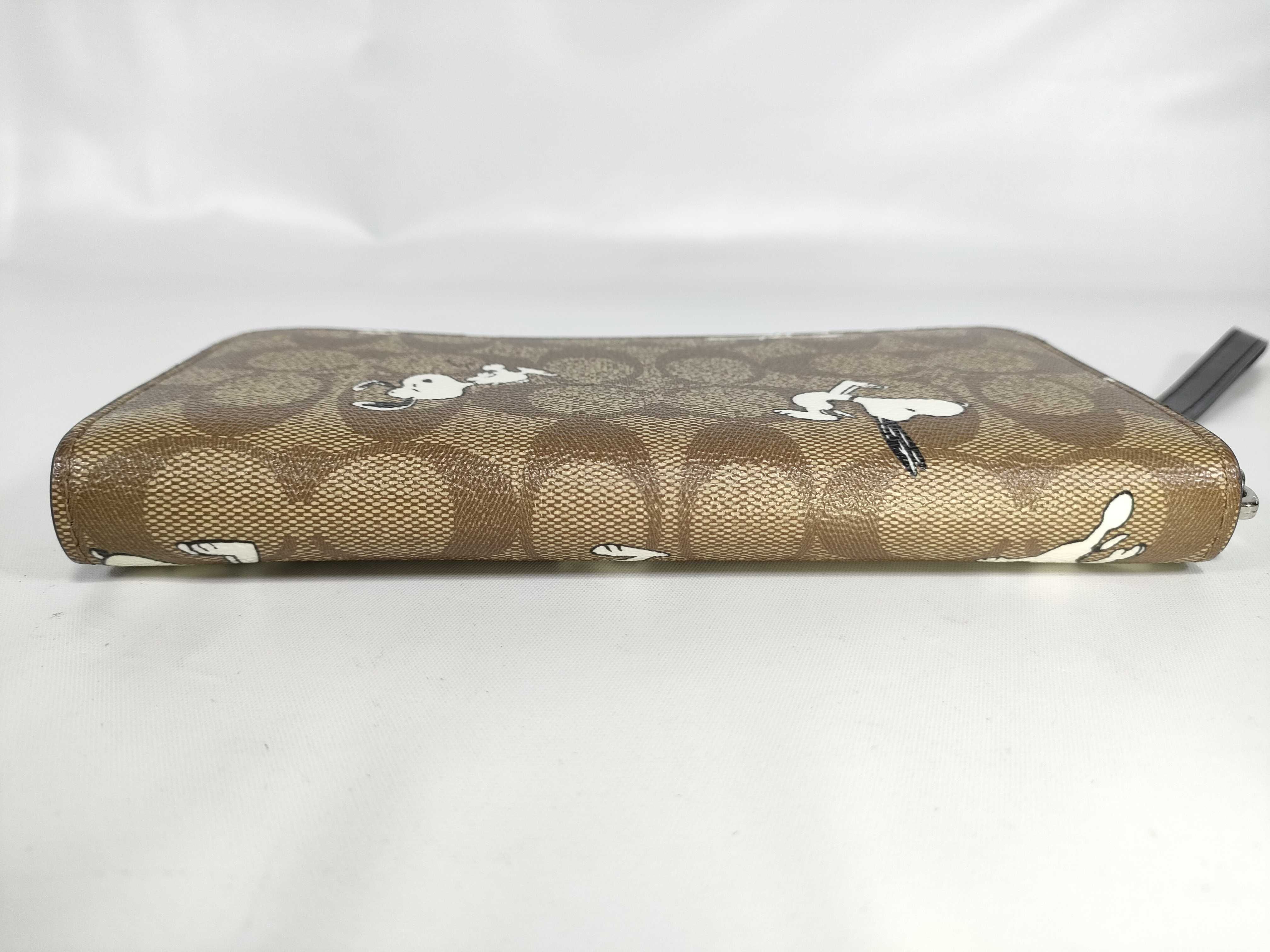 COACH x PEANUTS Long Zip Around Wallet in Signature Canvas with Snoopy