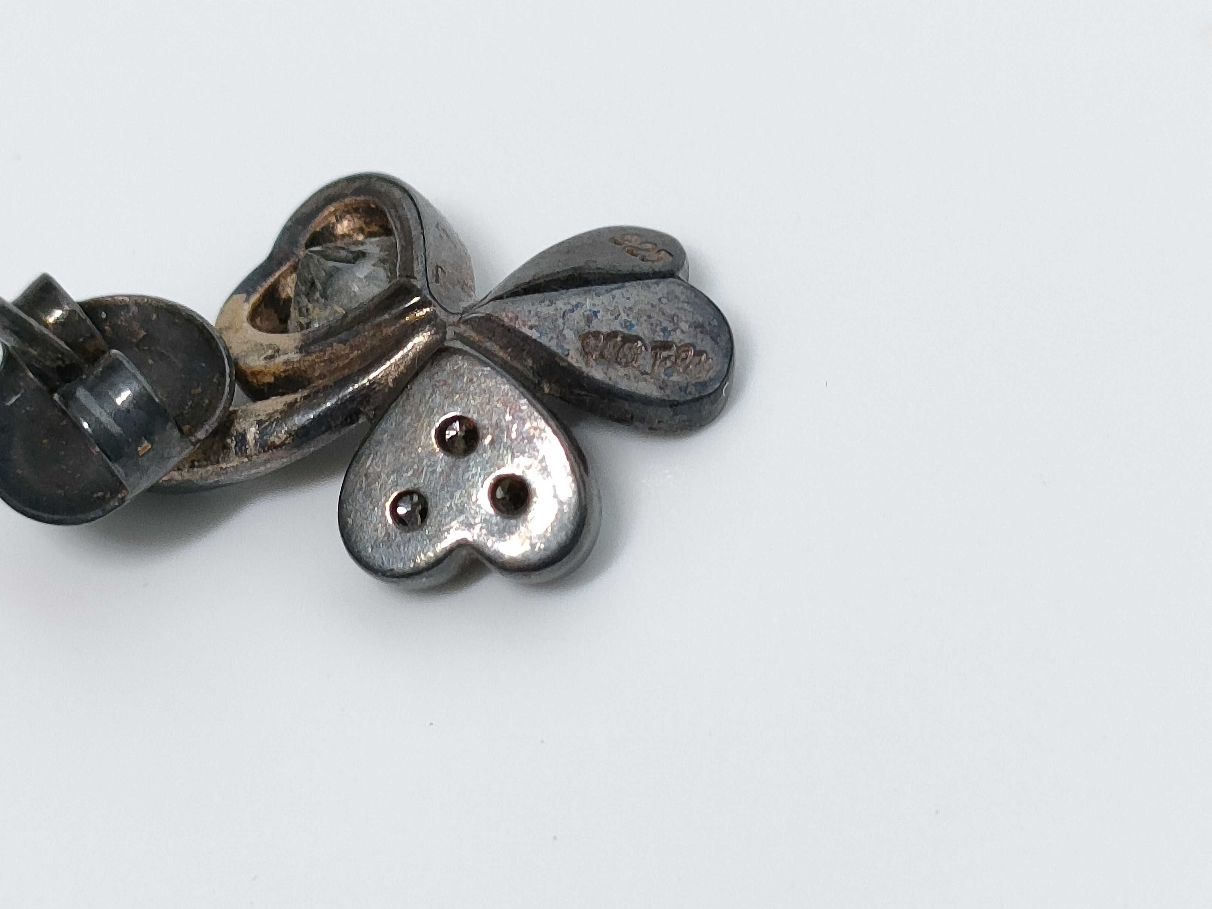 A Pair of Folli Follie Sterling Silver Heart Clover Stud Earrings