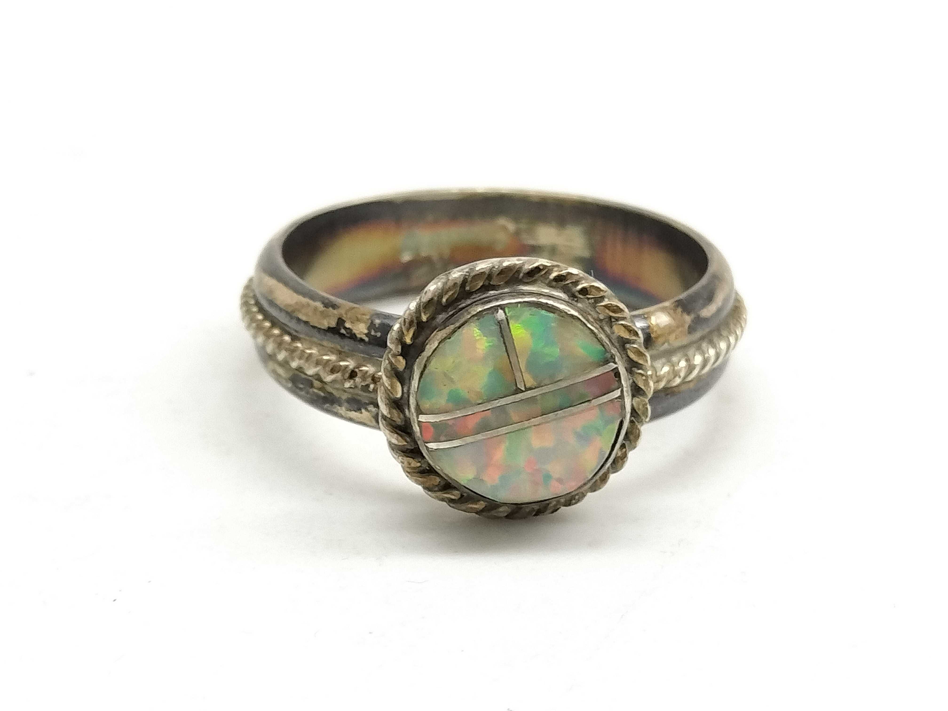 Two Pieces of Sterling Silver and Silver-Toned Jewelry Including a Guess Pendant Necklace and an Opal Inlay Ring