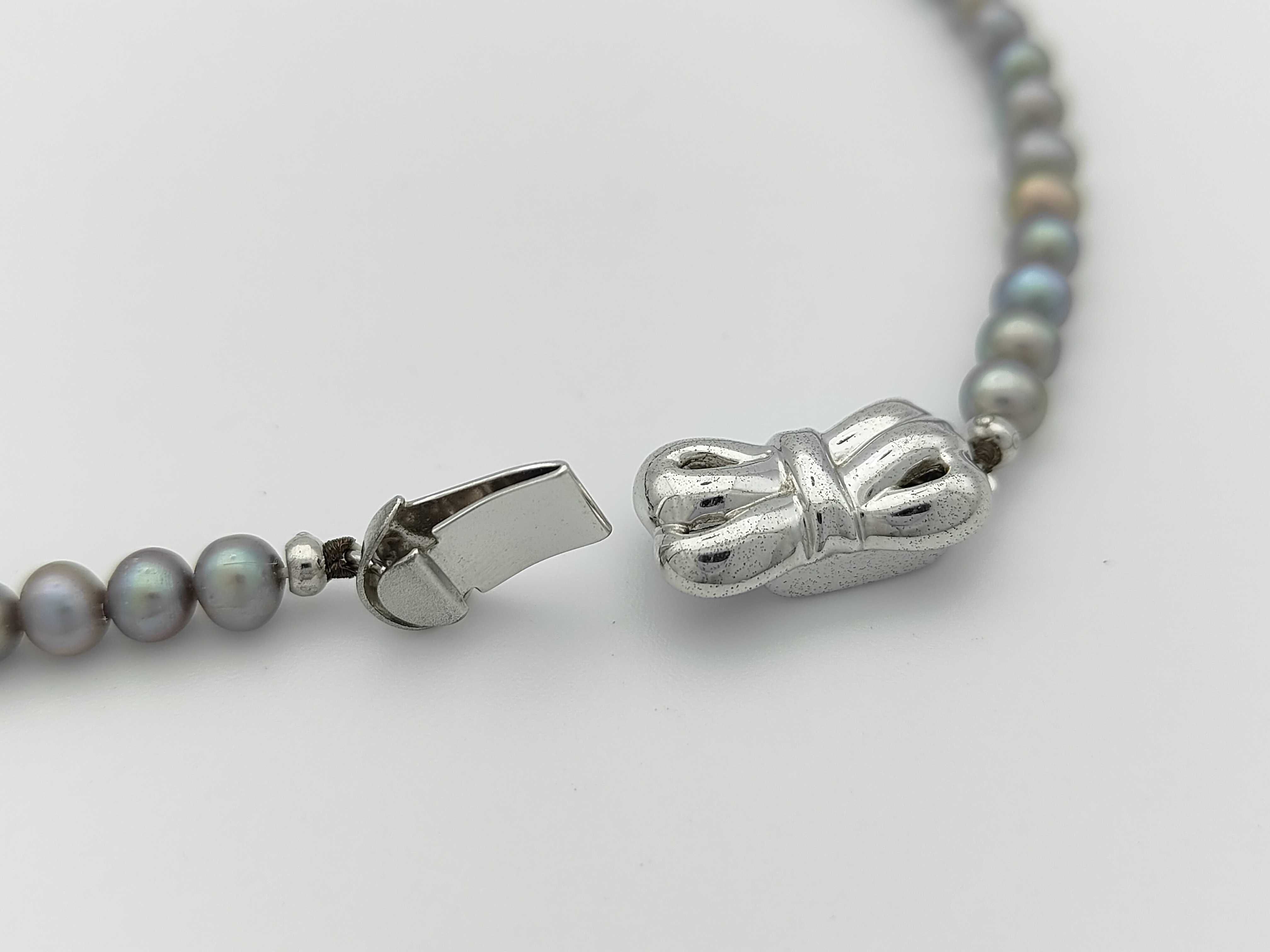 Graduated Black Cultured Pearl and Silver Necklace with Bow Clasp