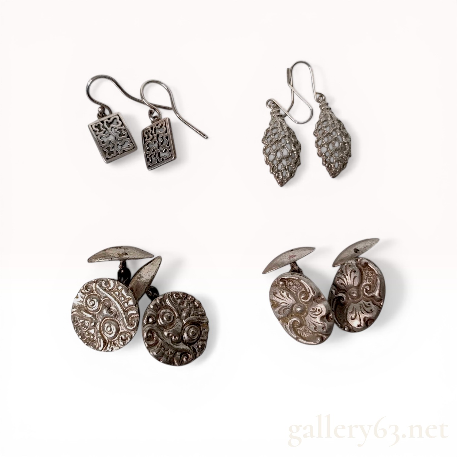 A Collection of Four Sets of Silver and.800 Silver Jewelry Including Spinx Cufflinks