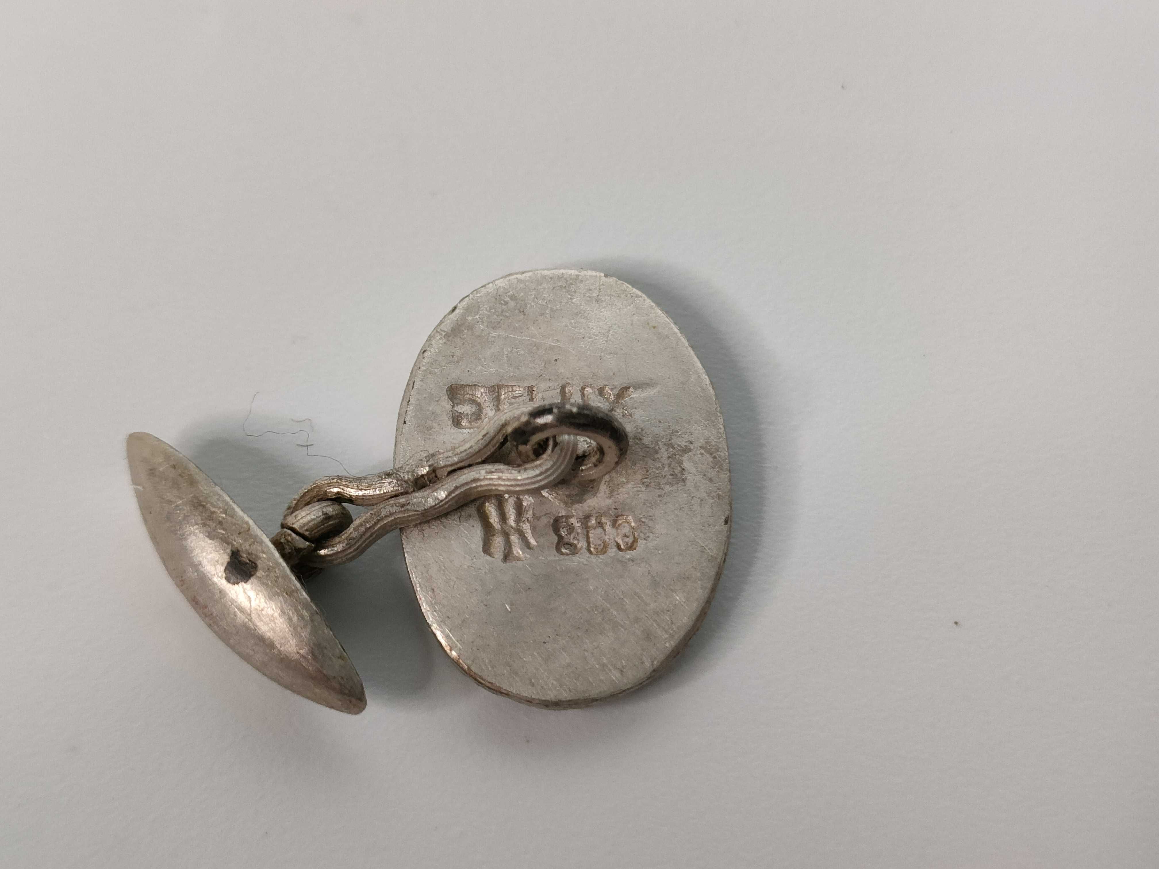 A Collection of Four Sets of Silver and.800 Silver Jewelry Including Spinx Cufflinks