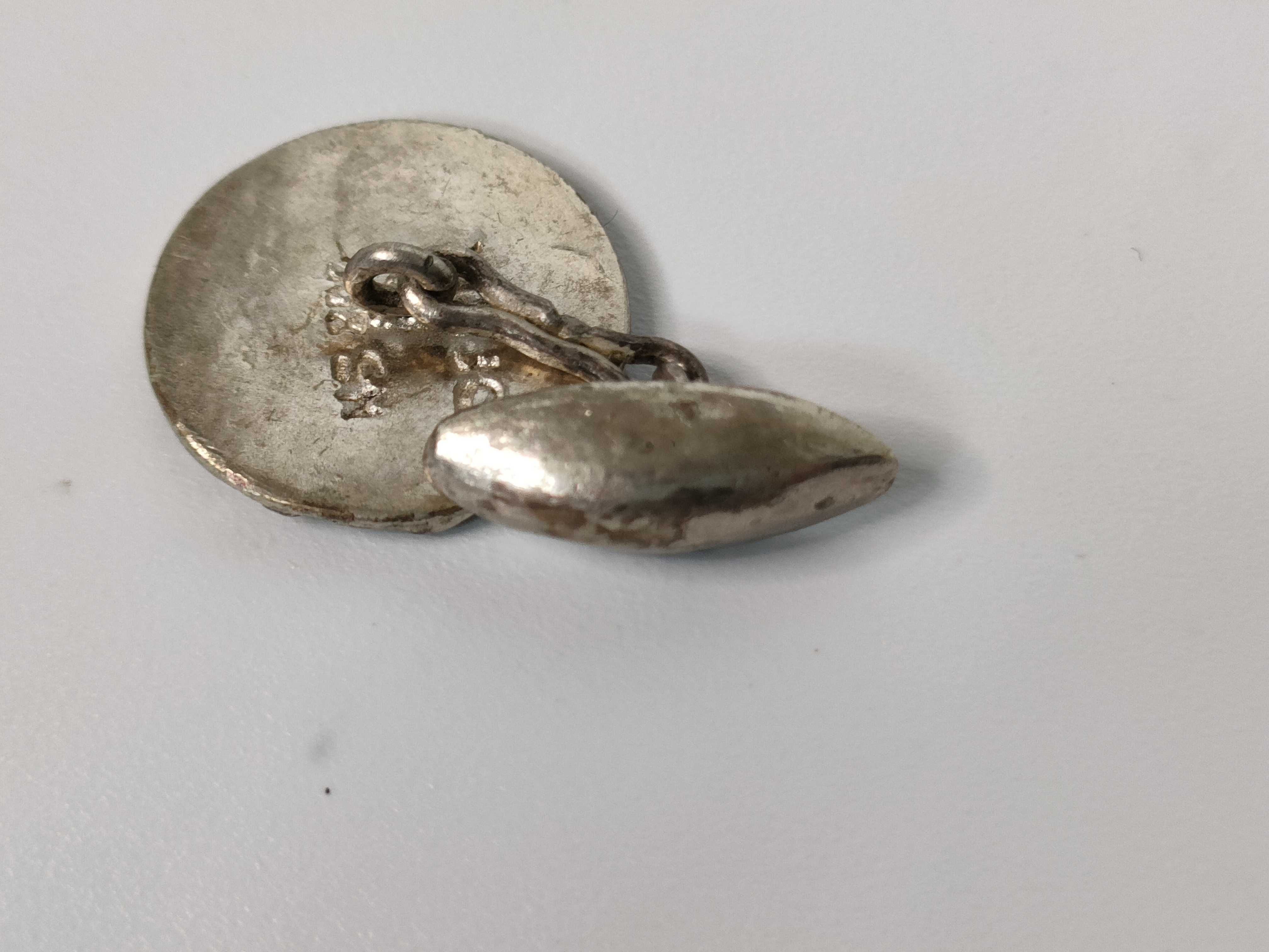 A Collection of Four Sets of Silver and.800 Silver Jewelry Including Spinx Cufflinks