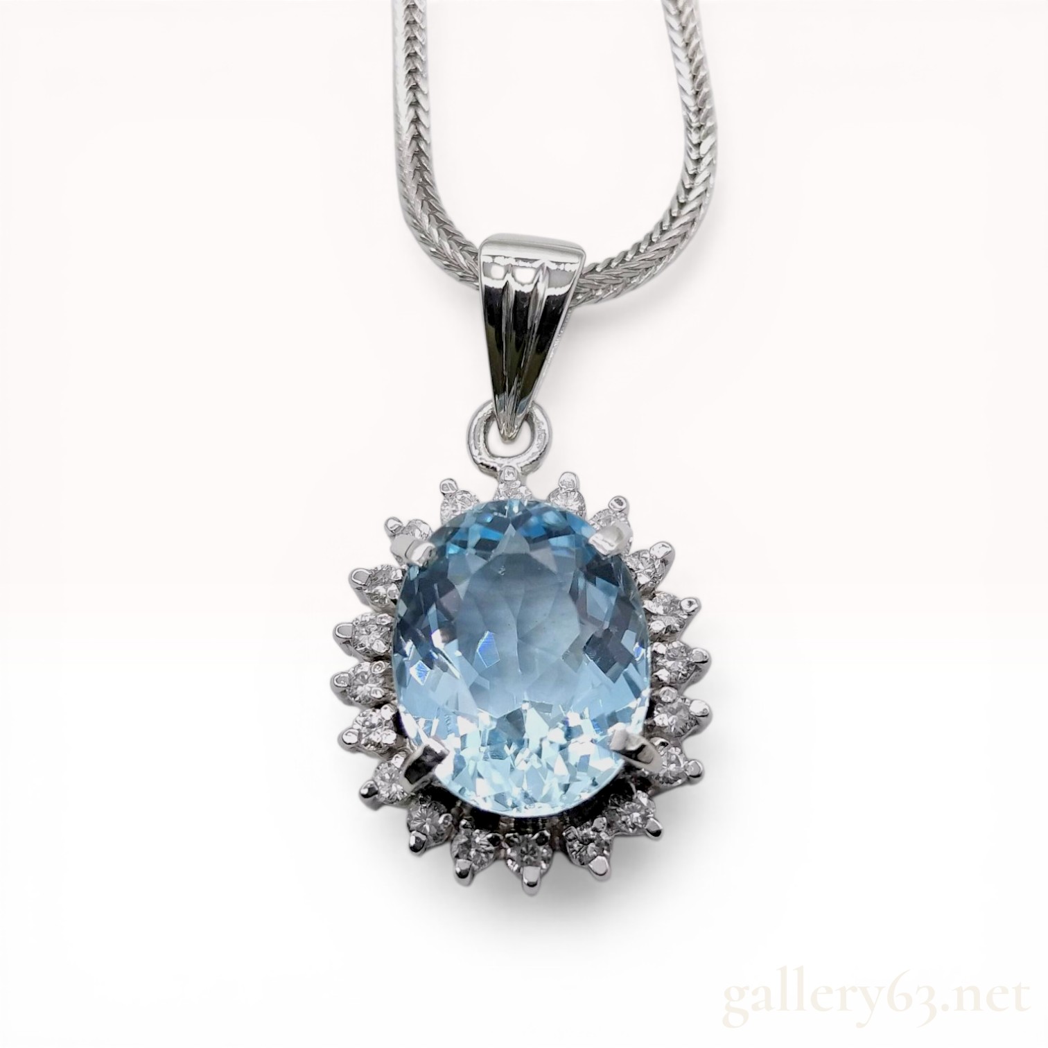 Platinum Aquamarine and Diamond Halo Pendant Necklace
