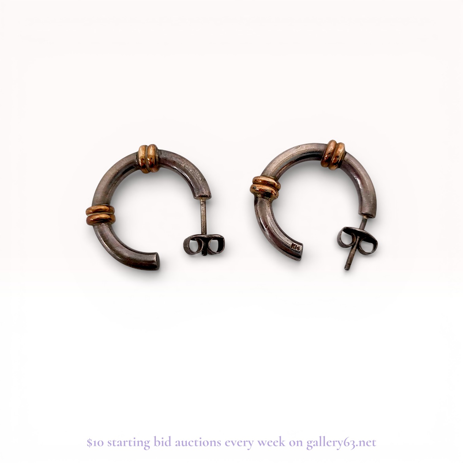 A Pair of Sterling Silver and 14 Karat Gold Two-Tone Hoop Earrings