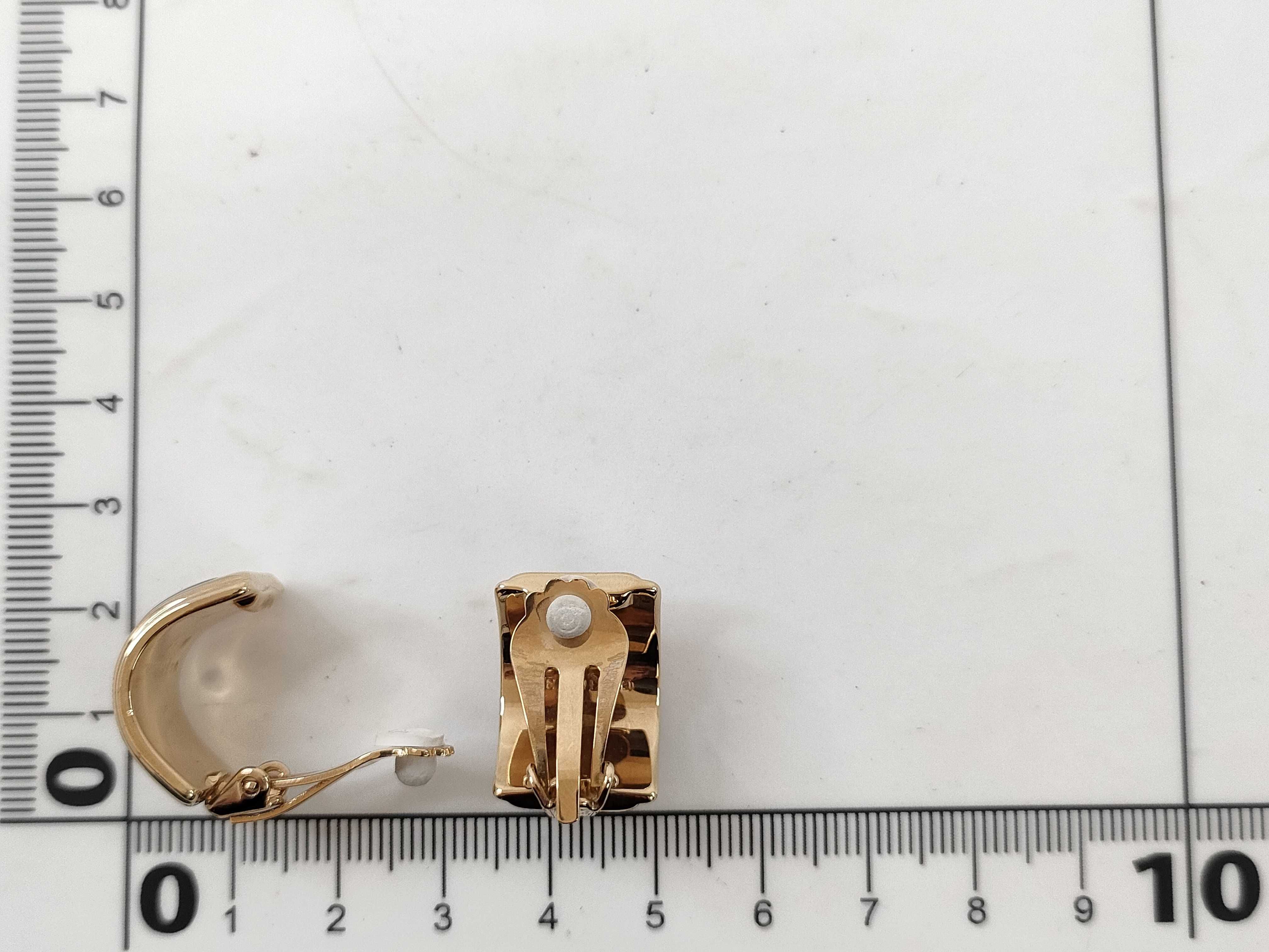 A Pair of Hermes Enameled Gold-Tone Clip-On Hoop Earrings