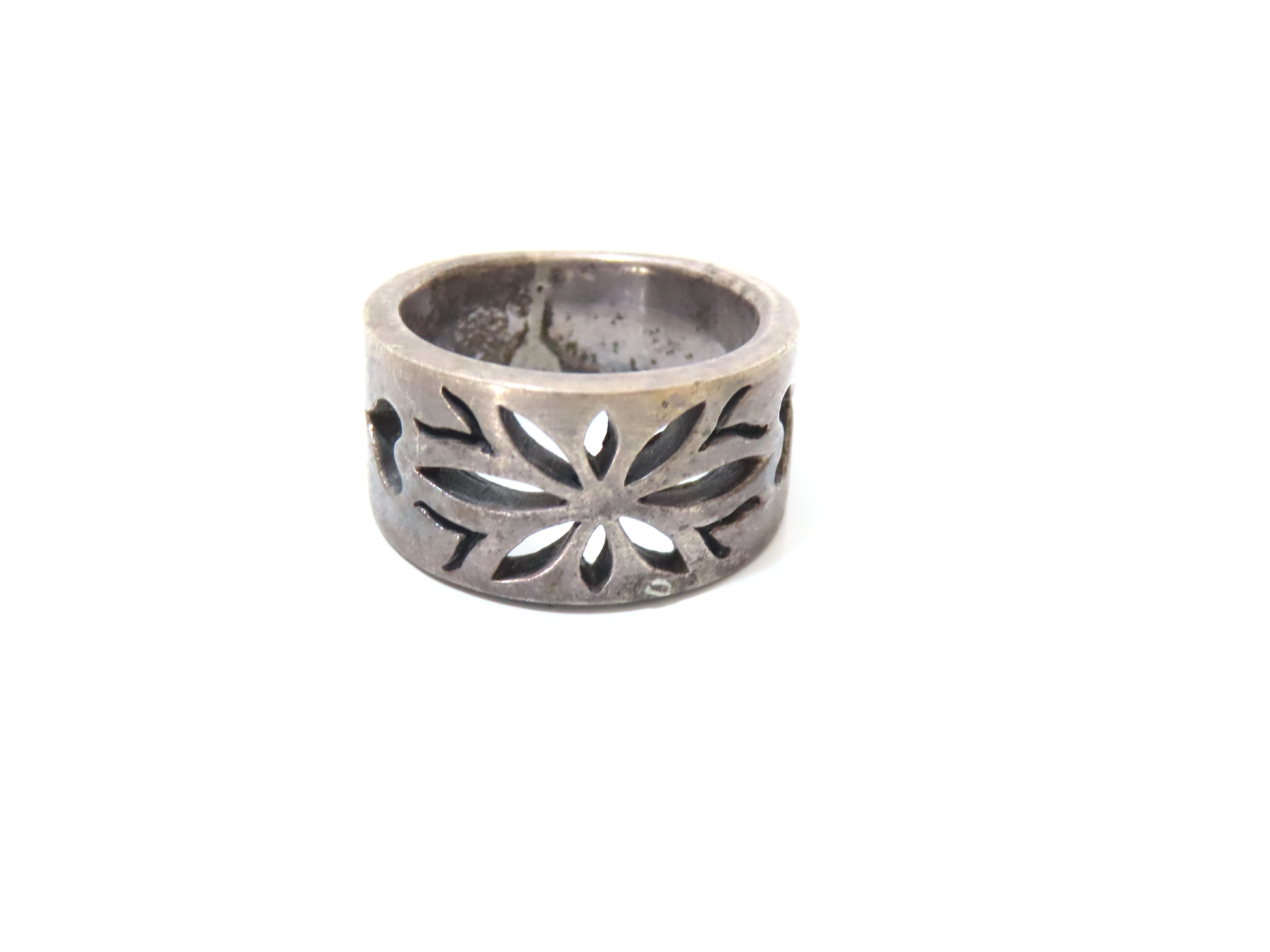 An Assortment of Five Pieces of Sterling Silver and Costume Jewelry