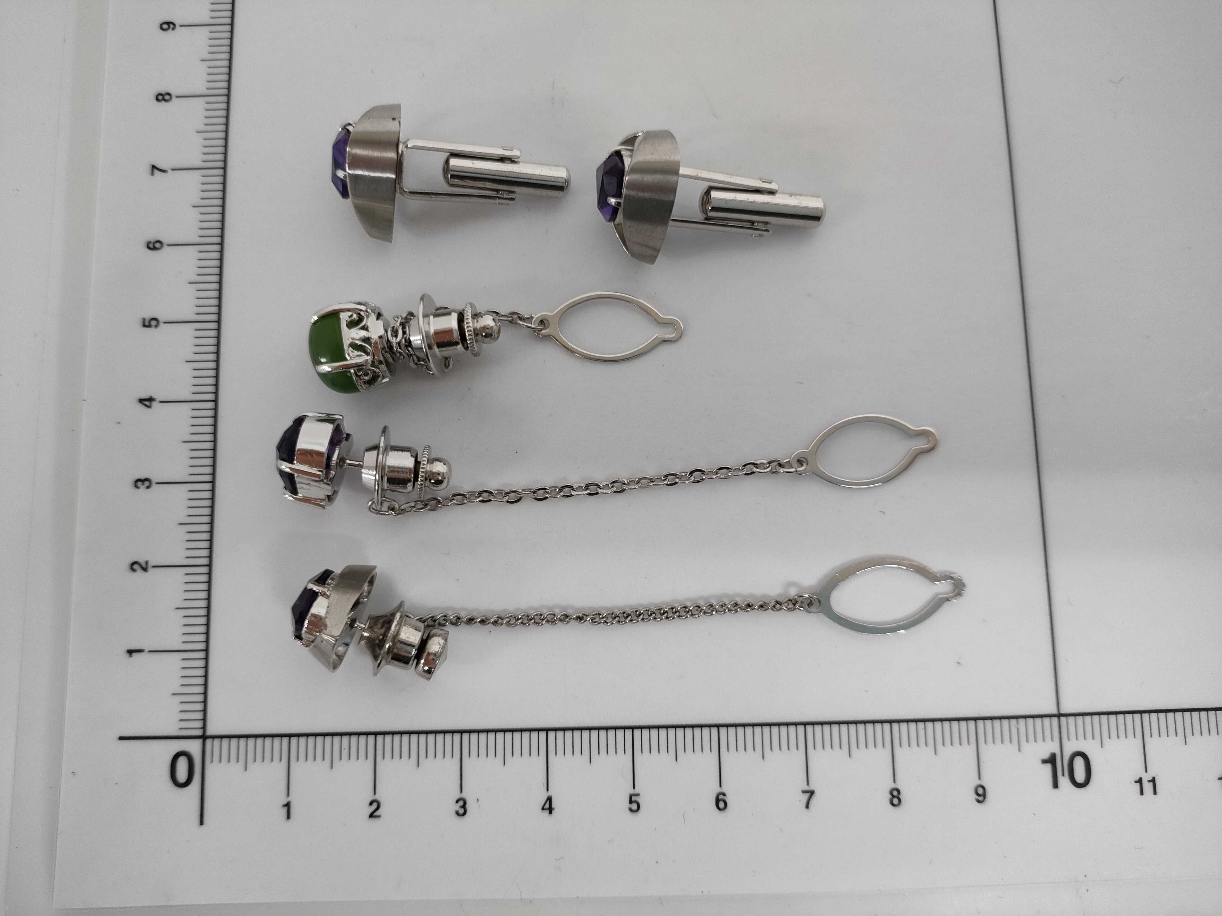 An Assortment of Men's 900 Silver and Amethyst Jewelry