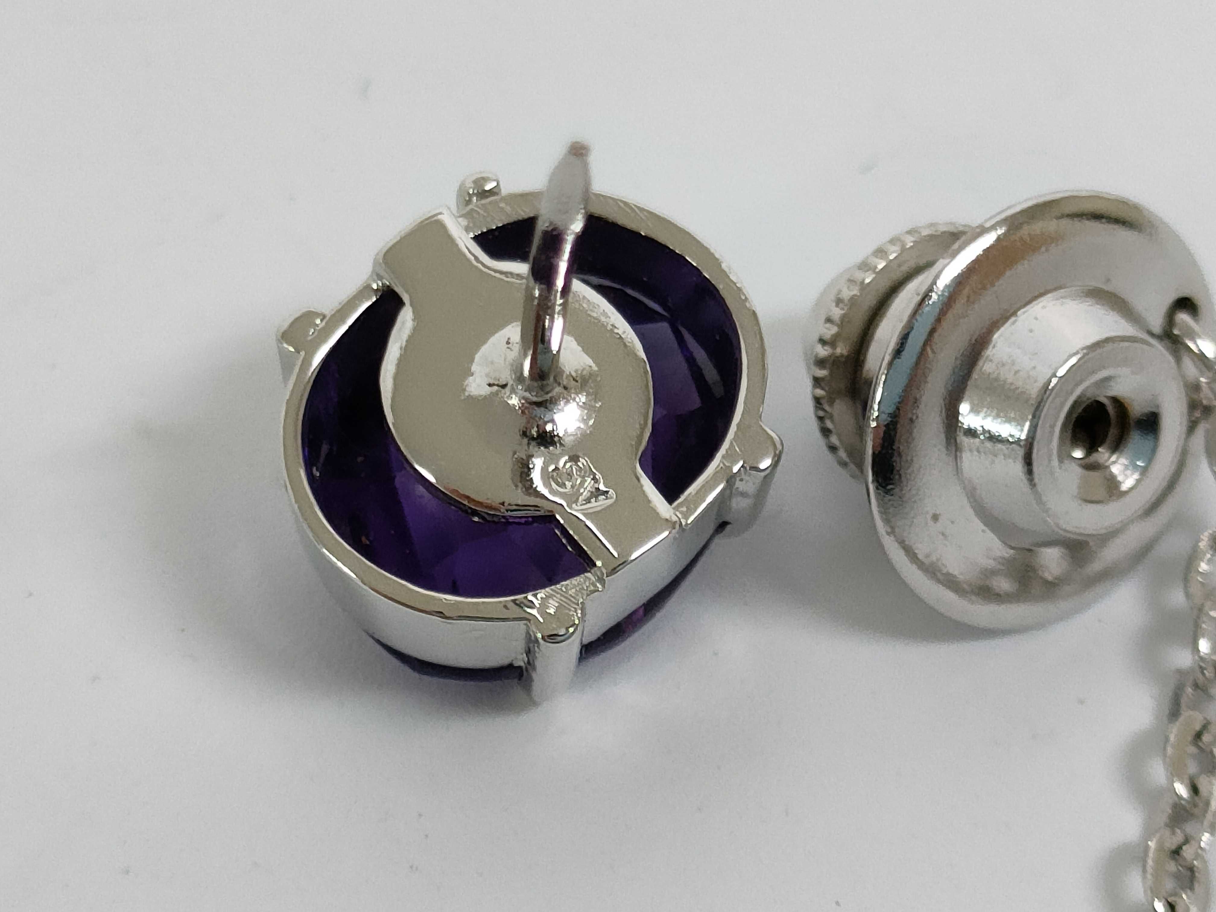 An Assortment of Men's 900 Silver and Amethyst Jewelry