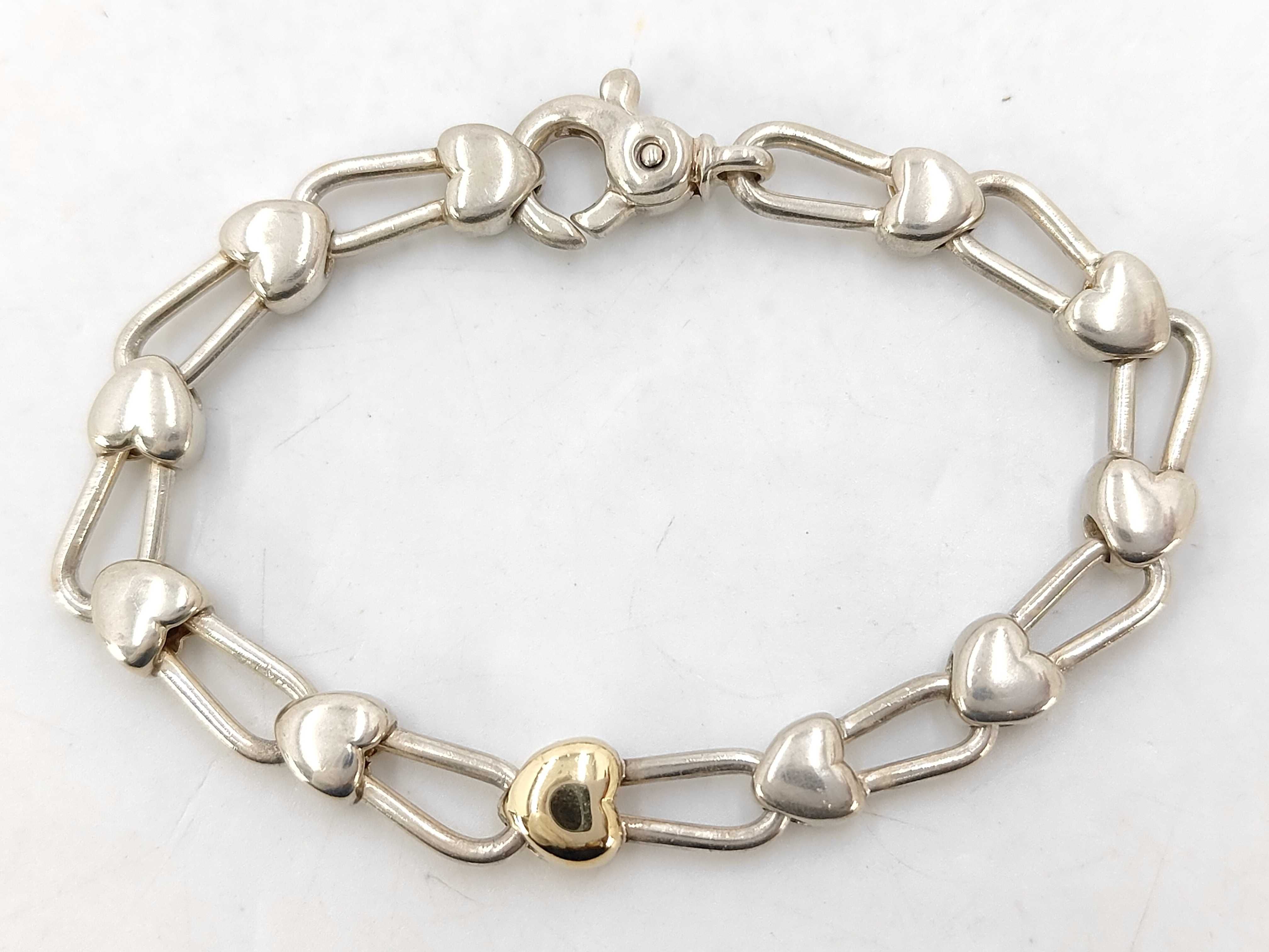 Tiffany and Co. Sterling Silver and 18 Karat Yellow Gold Heart Link Bracelet
