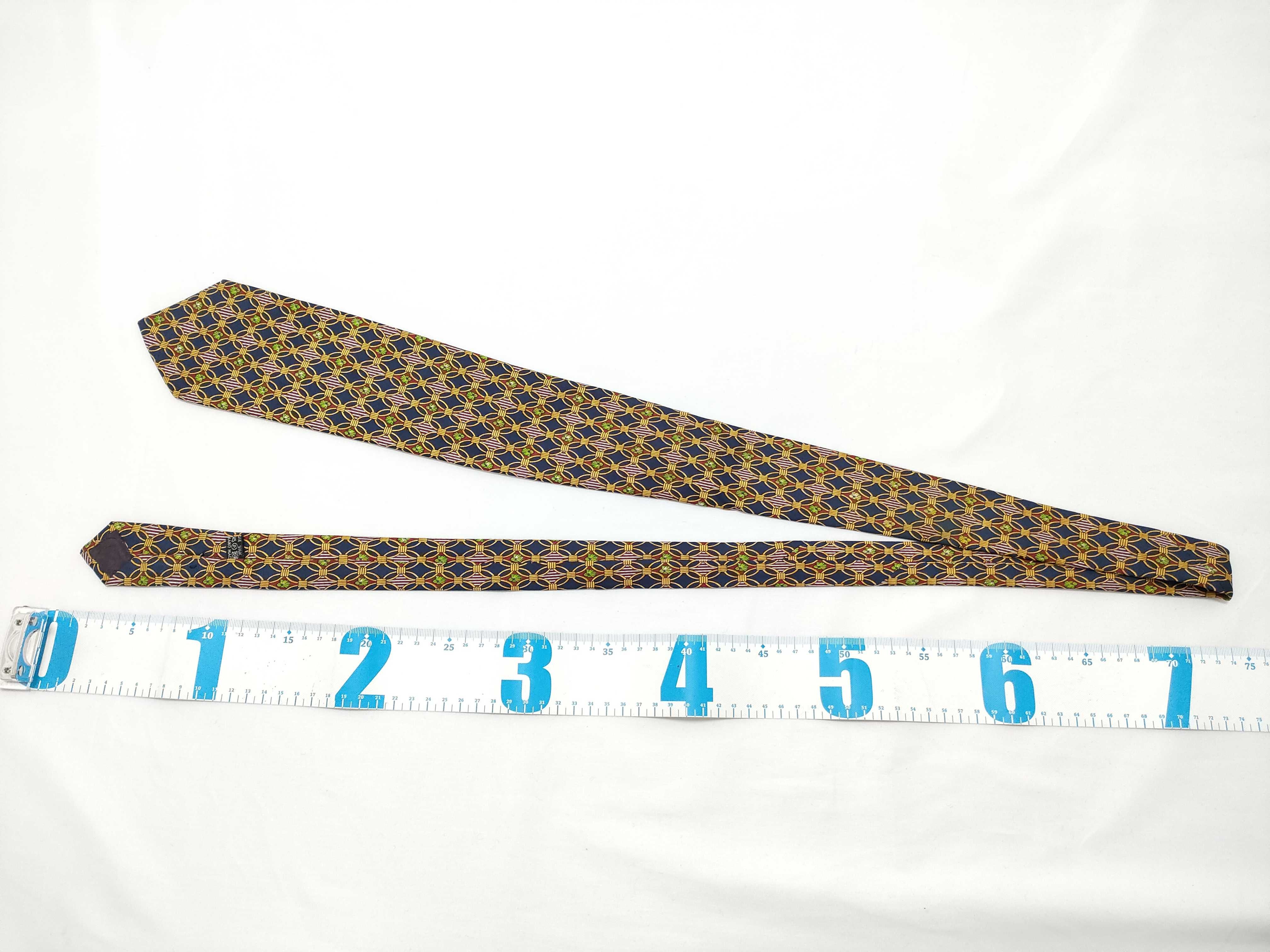 A Trio of Designer Silk Neckties by Salvatore Ferragamo, Christian Dior, and Celine