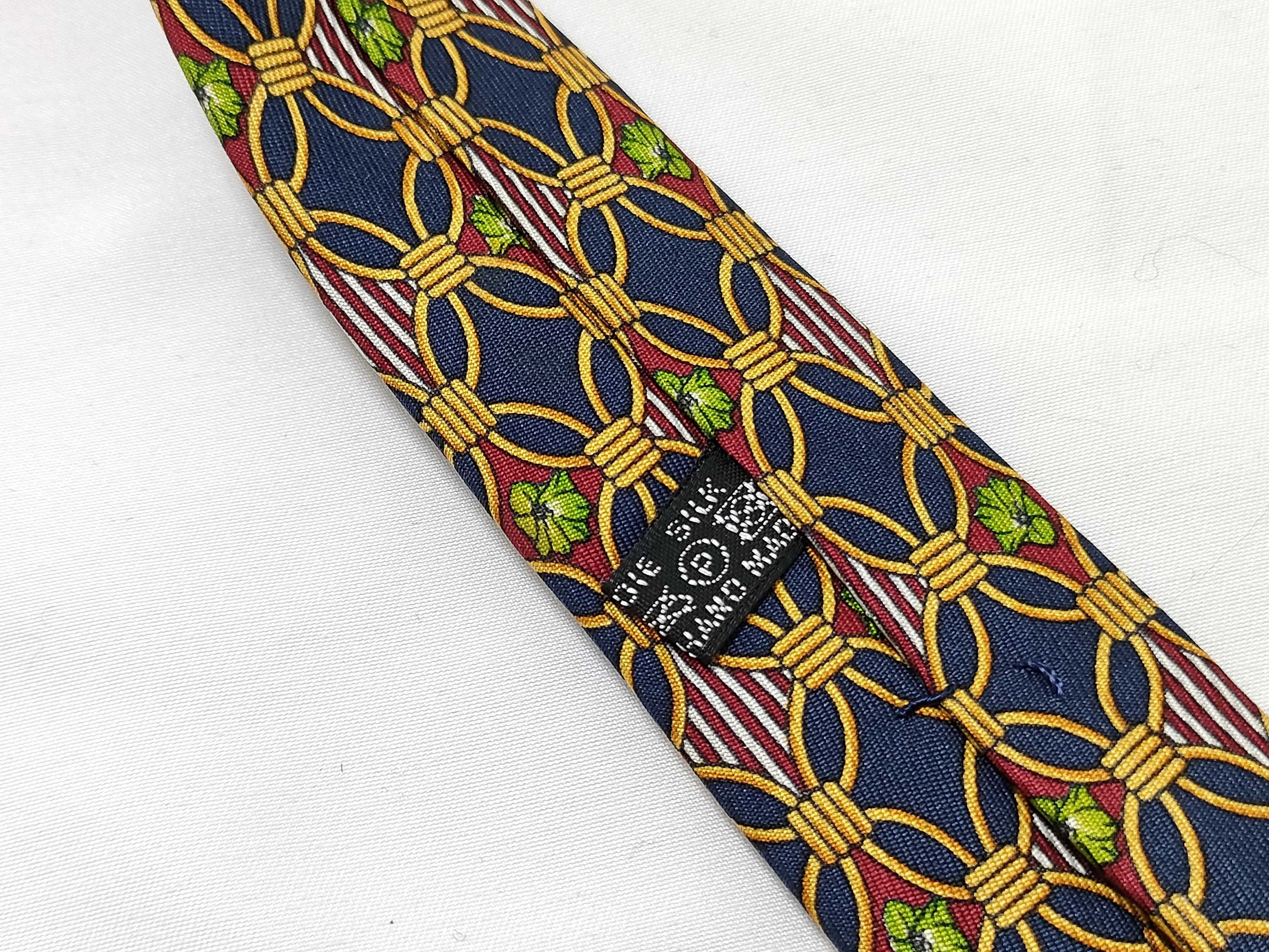 A Trio of Designer Silk Neckties by Salvatore Ferragamo, Christian Dior, and Celine