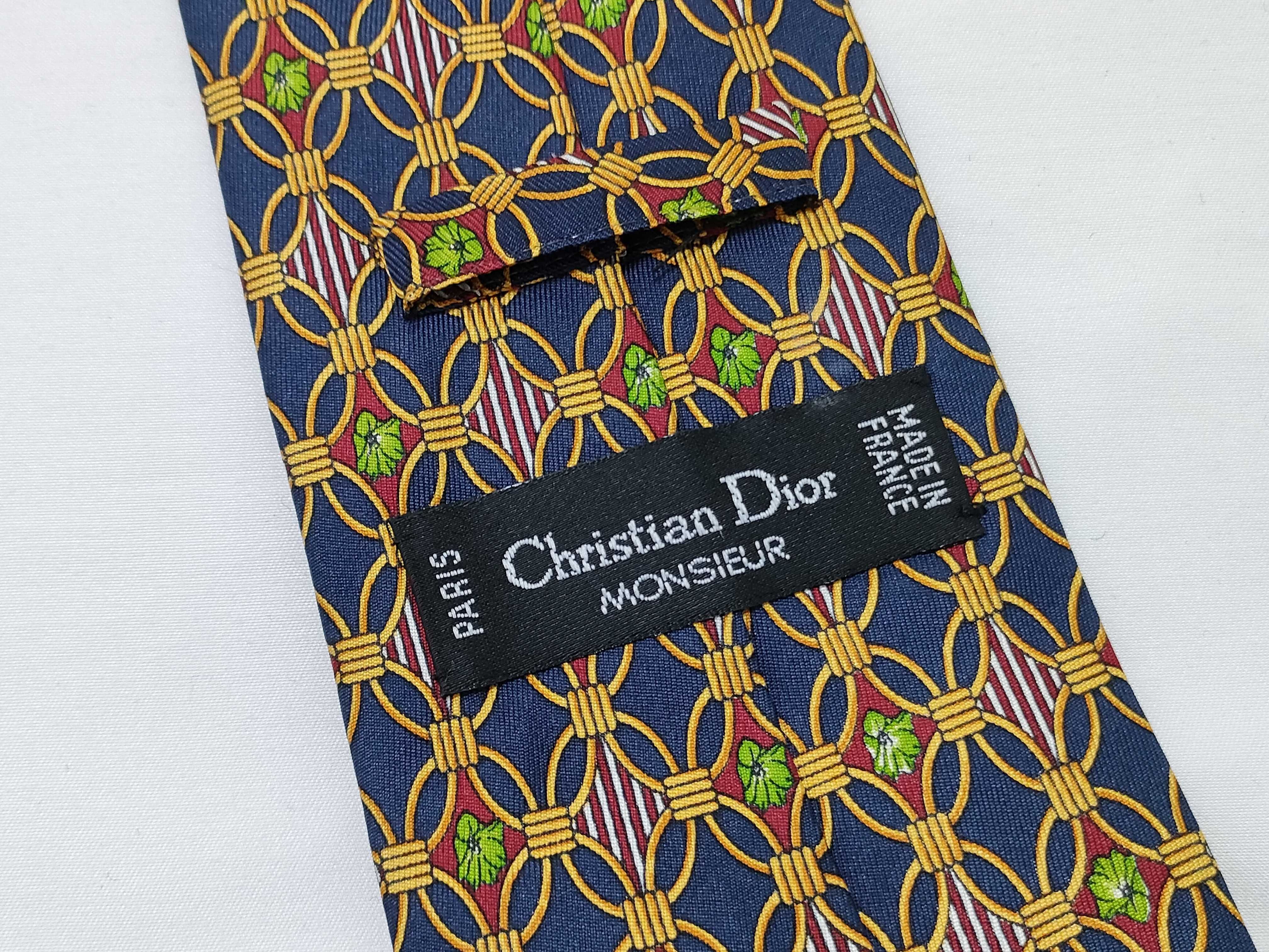 A Trio of Designer Silk Neckties by Salvatore Ferragamo, Christian Dior, and Celine