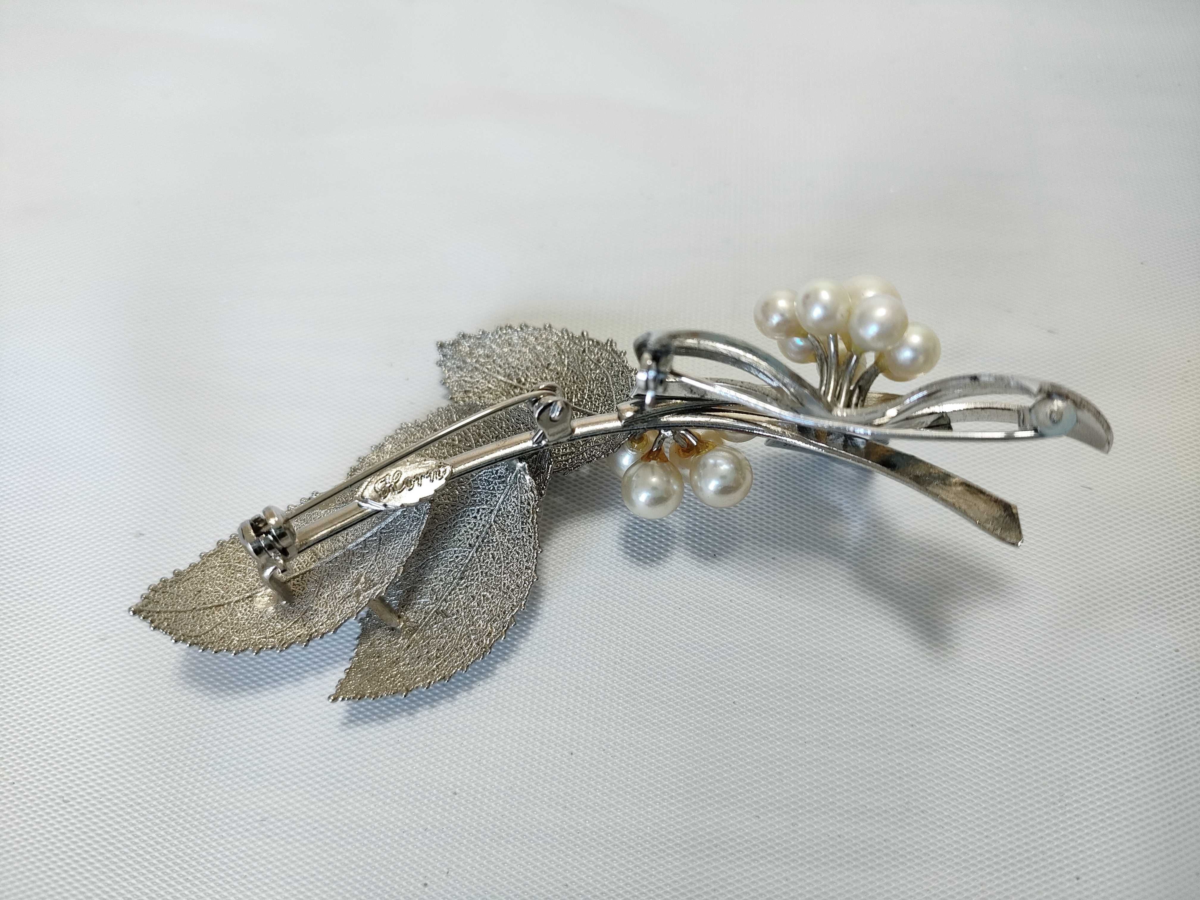 Seven Sterling Silver Vintage and Contemporary Pearl Brooches