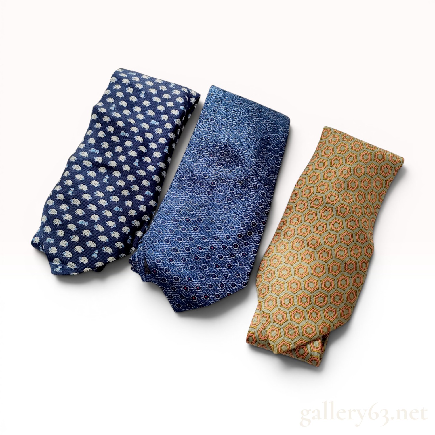 Three Hermes Printed Silk Neckties in Figural and Geometric Patterns