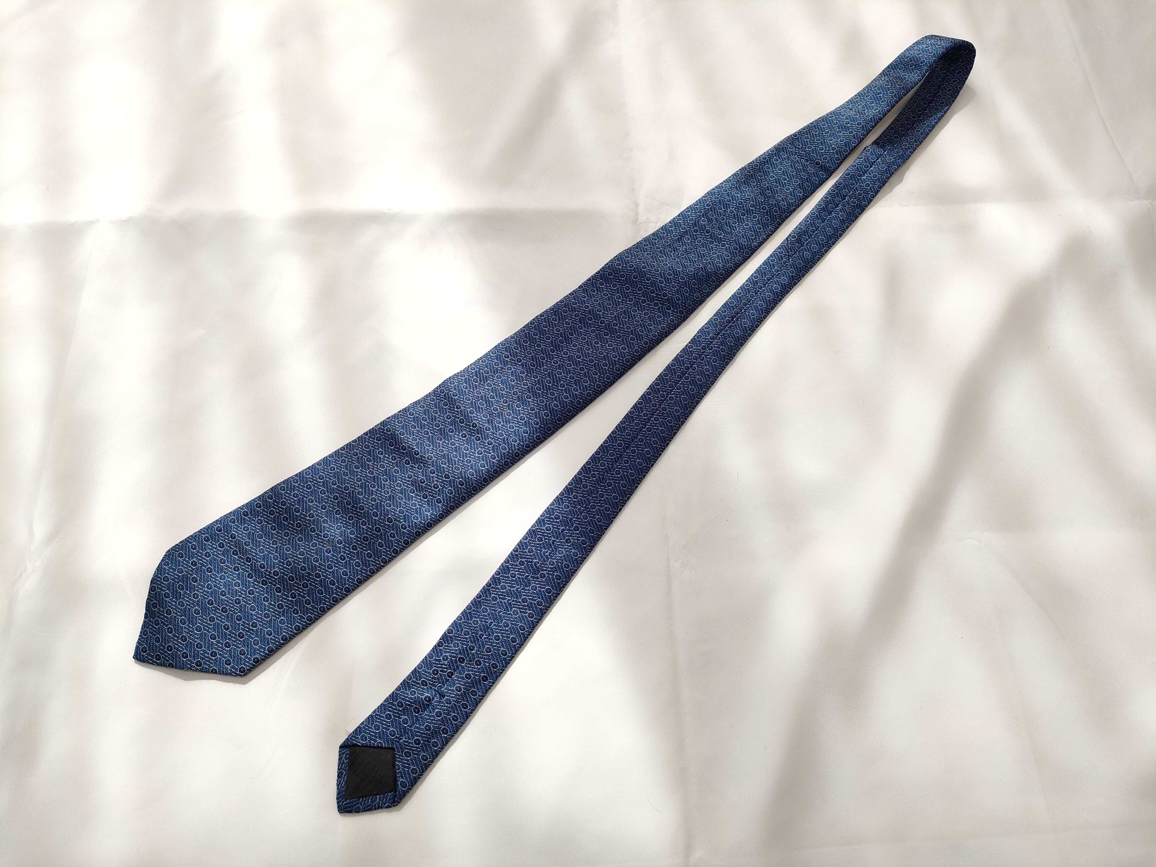 Three Hermes Printed Silk Neckties in Figural and Geometric Patterns