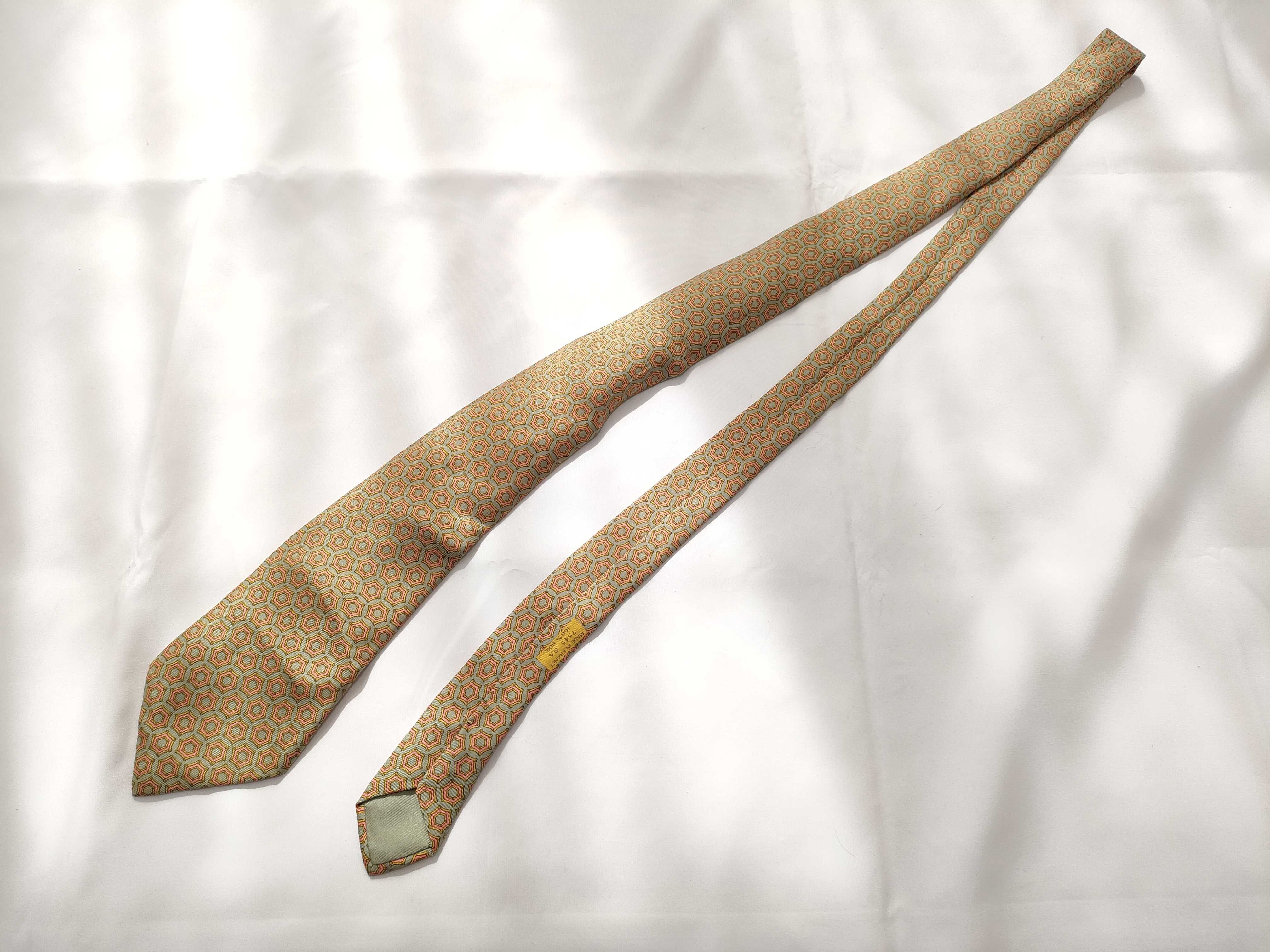 Three Hermes Printed Silk Neckties in Figural and Geometric Patterns