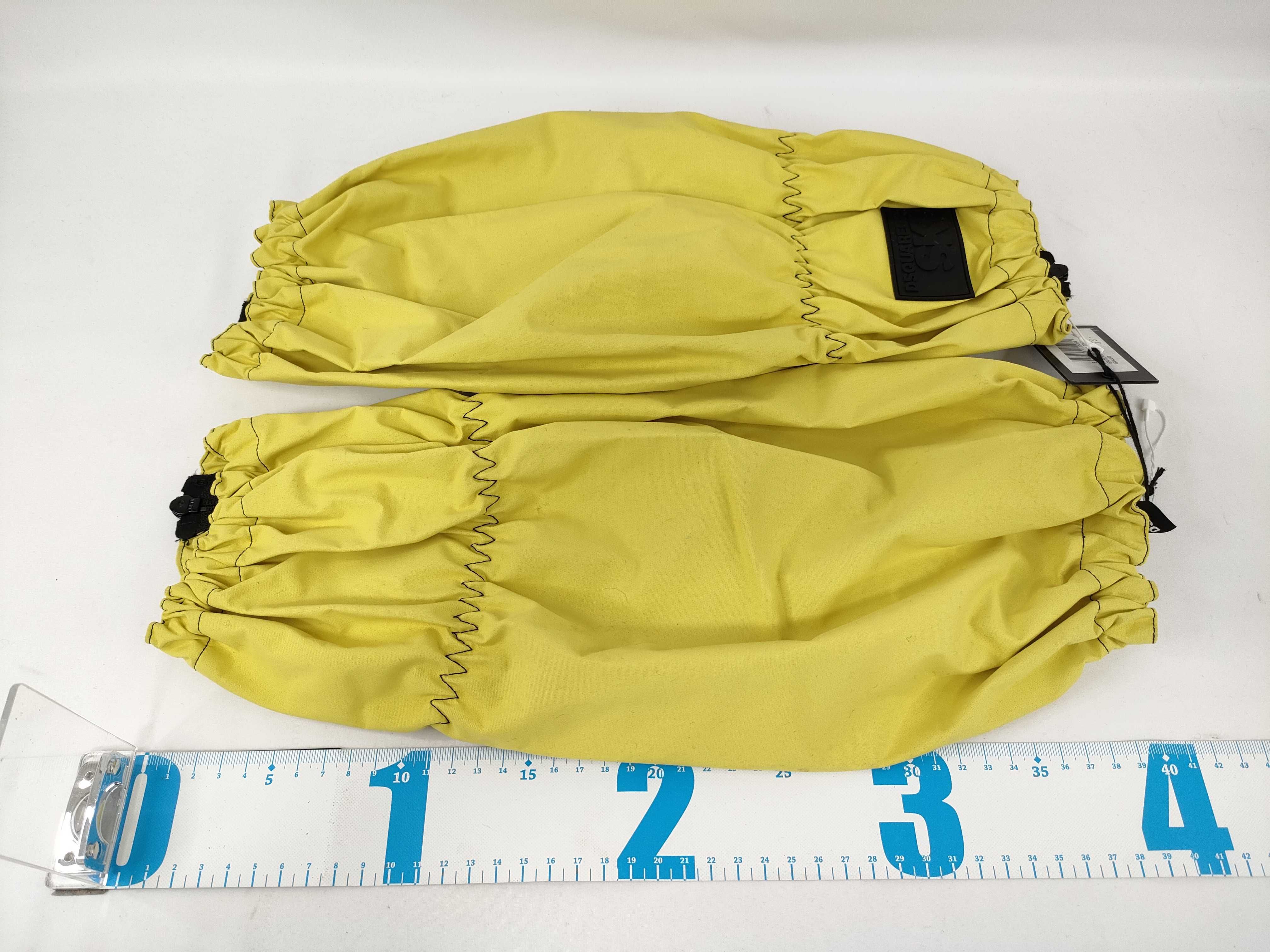 A Pair of Dsquared2 Ski Acid Yellow Technical Zippered Gaiters