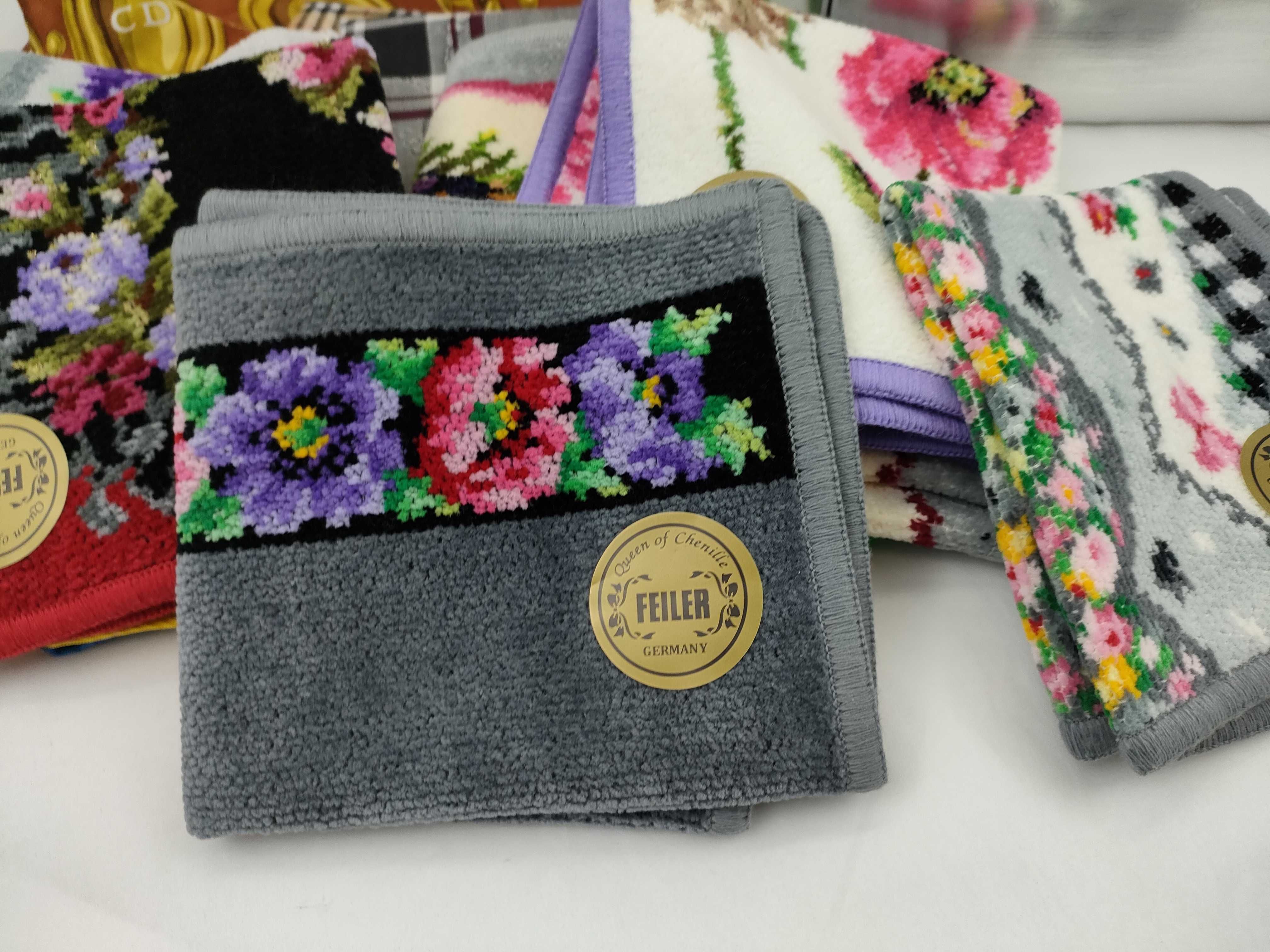 A Collection of Designer Scarves and Pocket Squares Including Christian Dior, Nina Ricci, MCM, and Feiler