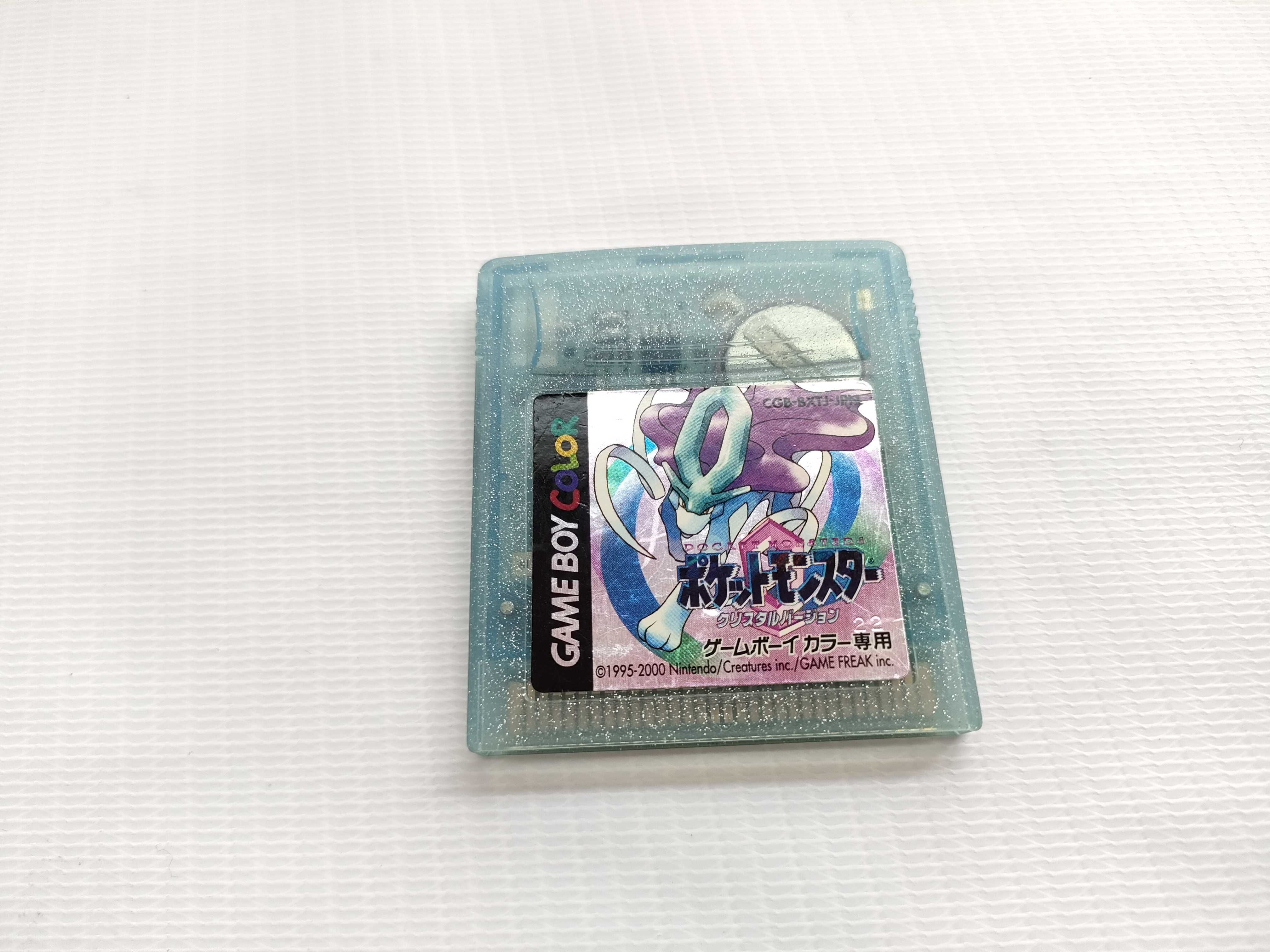 Nintendo Game Boy Color Console CGB-001 Atomic Purple and Japanese Pokemon Crystal Game Cartridge