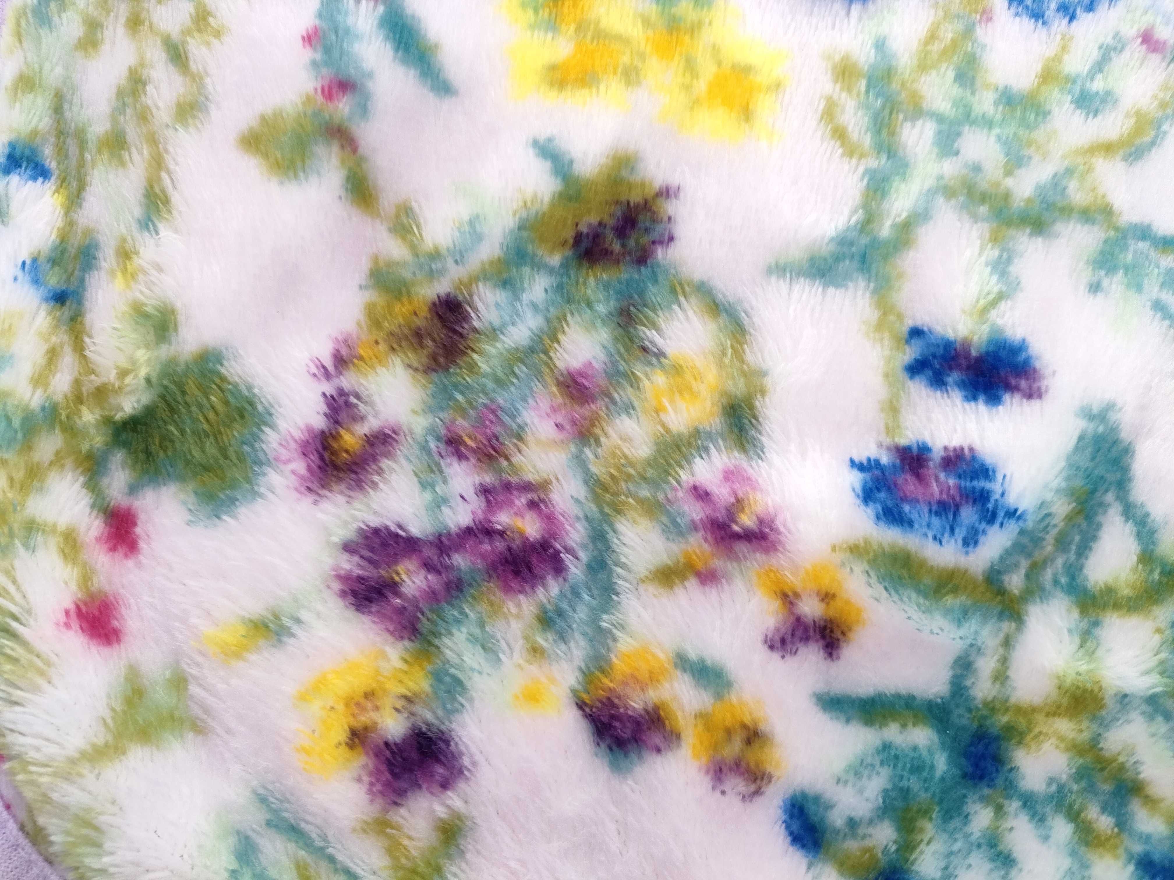 An Assortment of Feiler Floral Chenille Textiles and Plush Throw