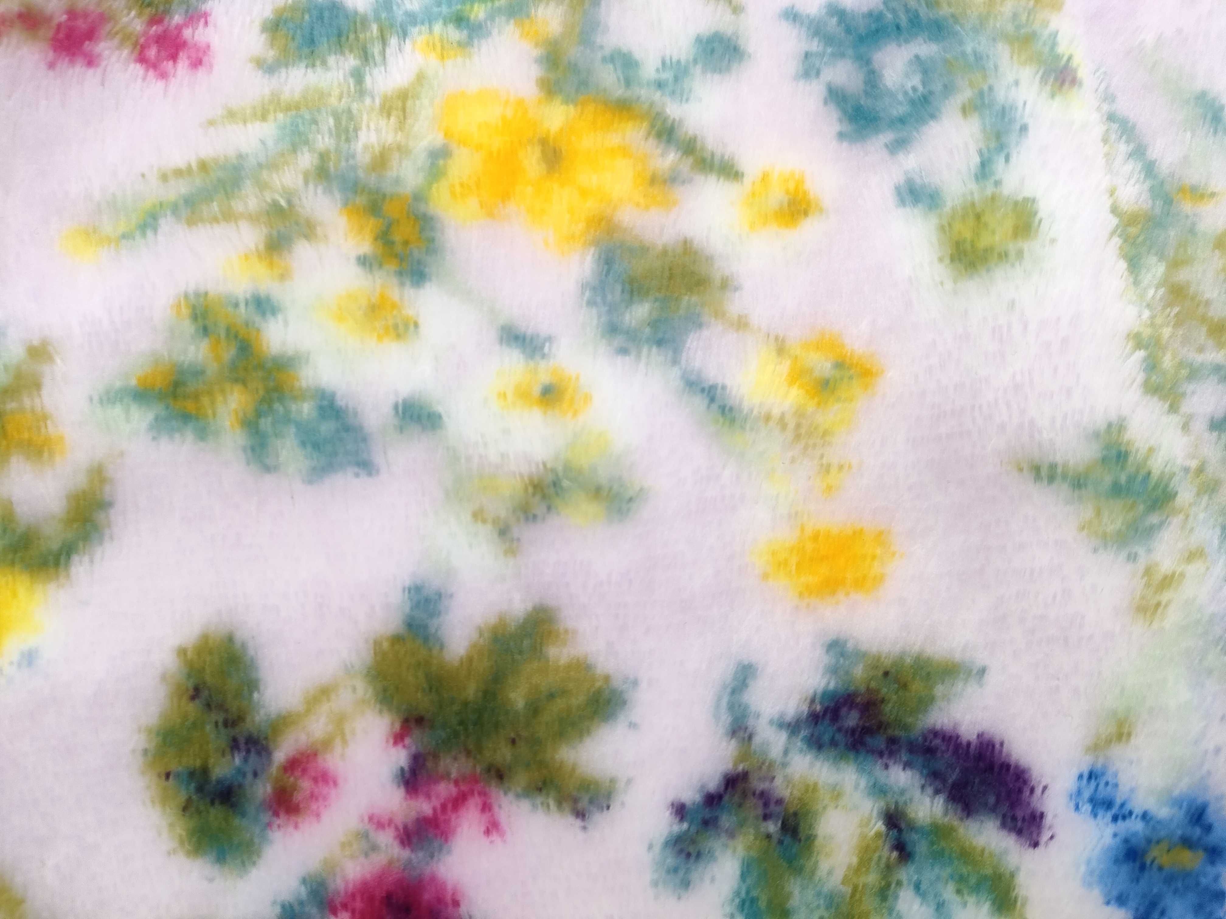 An Assortment of Feiler Floral Chenille Textiles and Plush Throw