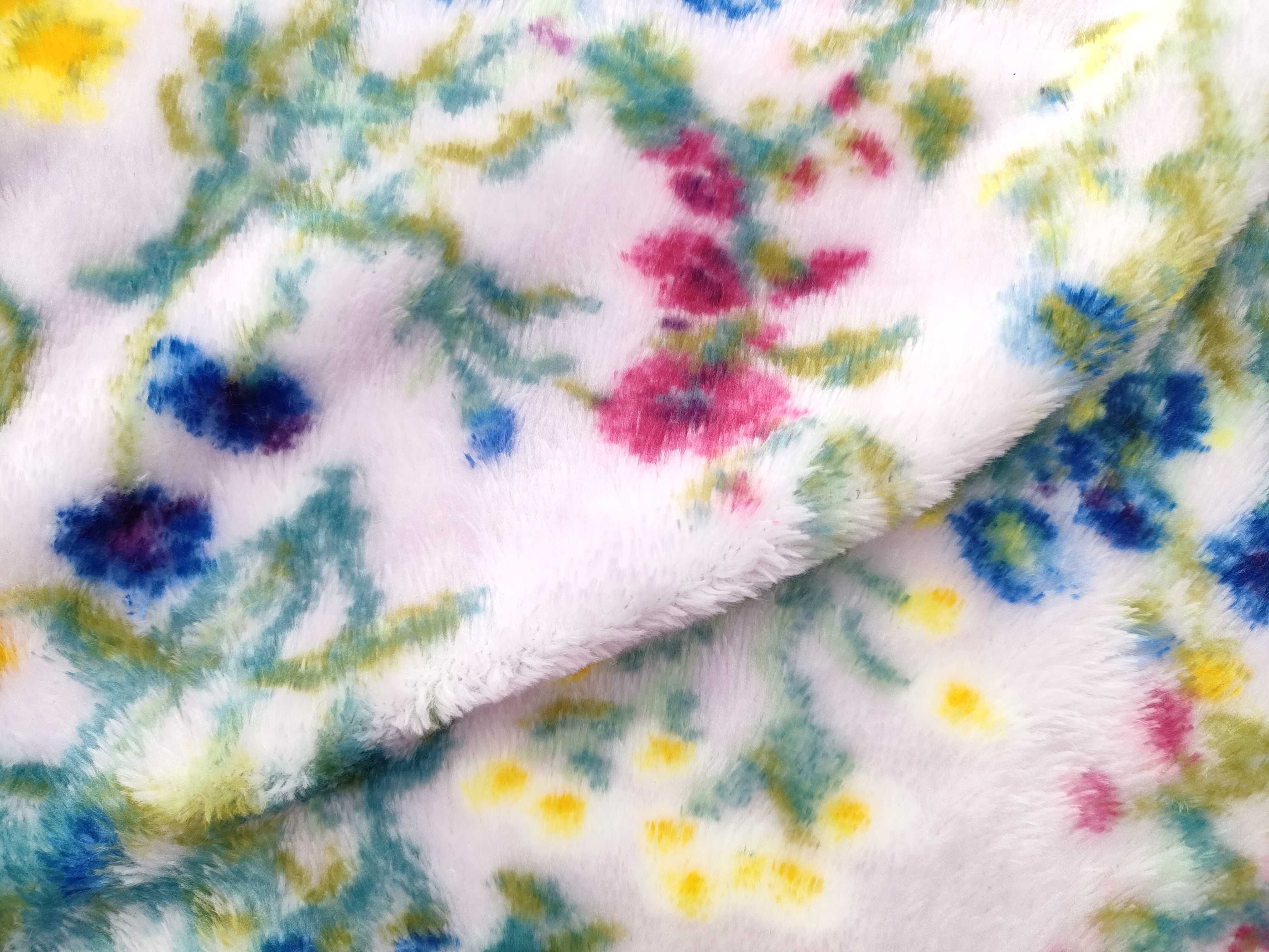 An Assortment of Feiler Floral Chenille Textiles and Plush Throw