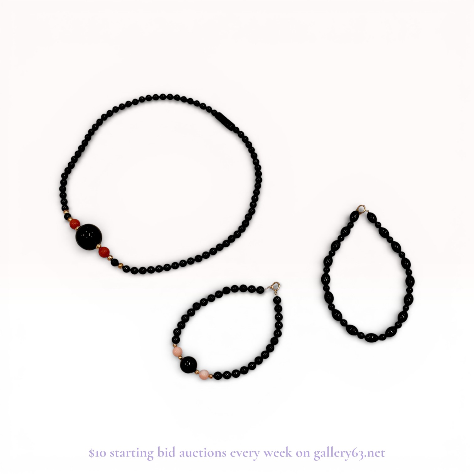 A Trio of Beaded Jewelry Including a Necklace and Two Bracelets