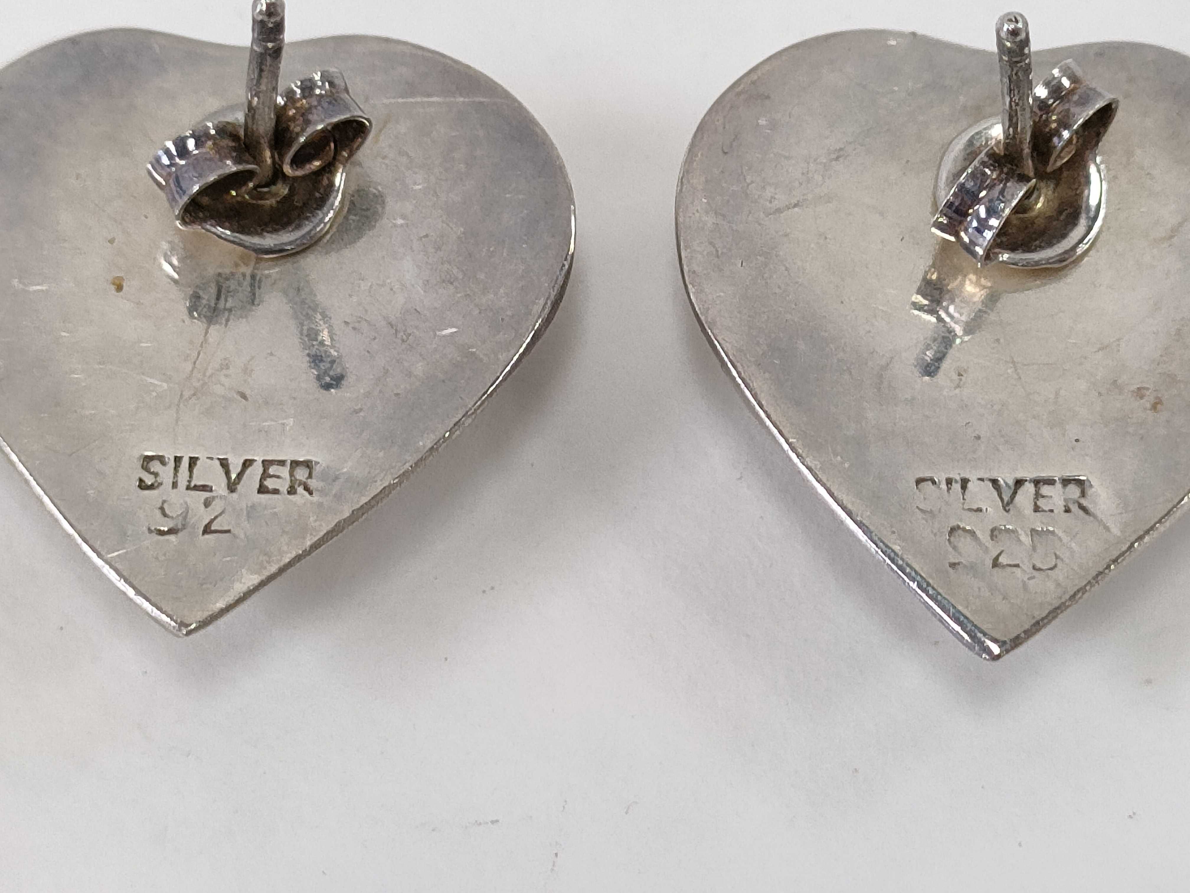 An Assortment of Four Pairs of Sterling Silver Earrings