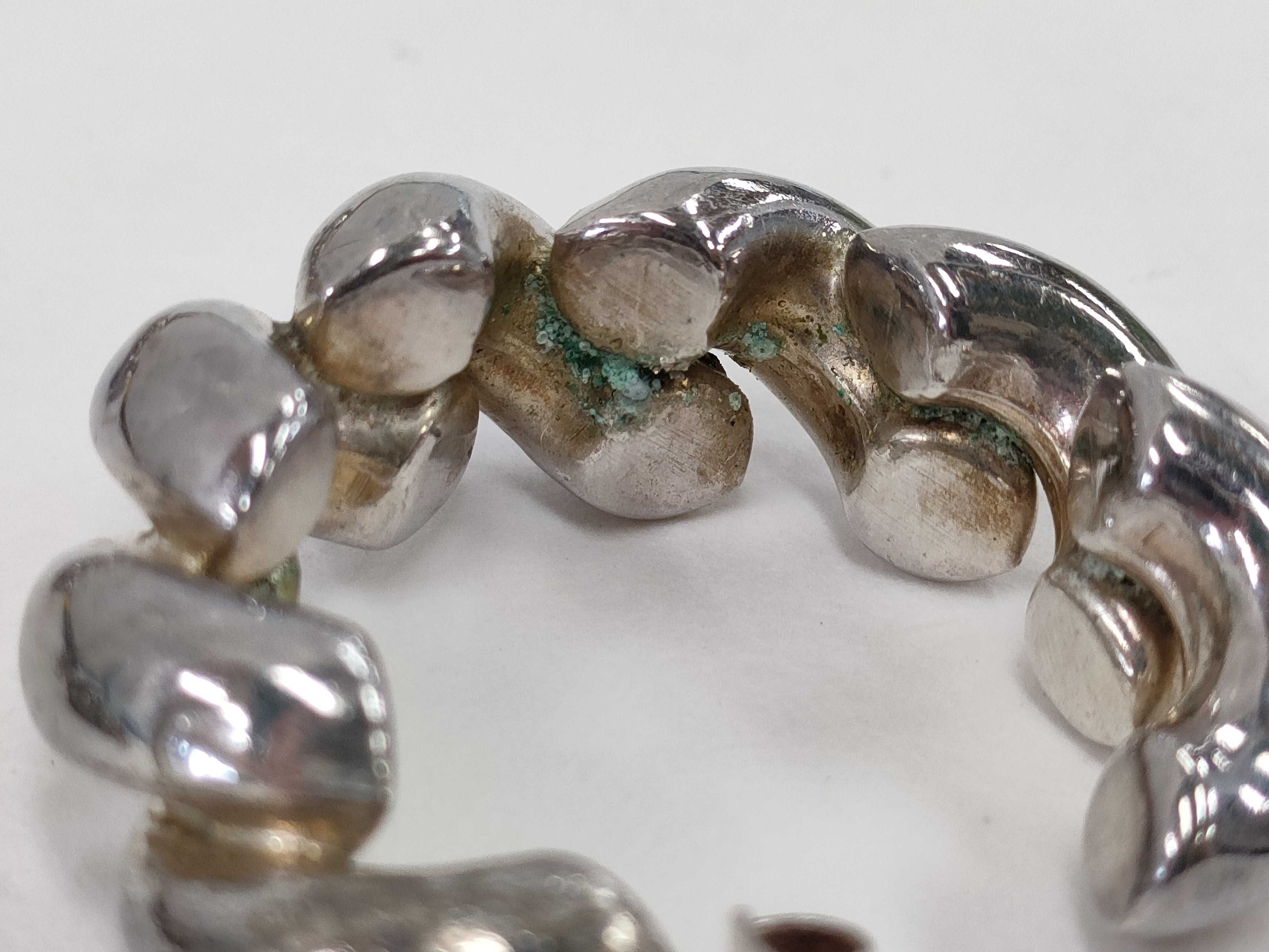 An Assortment of Four Pairs of Sterling Silver Earrings