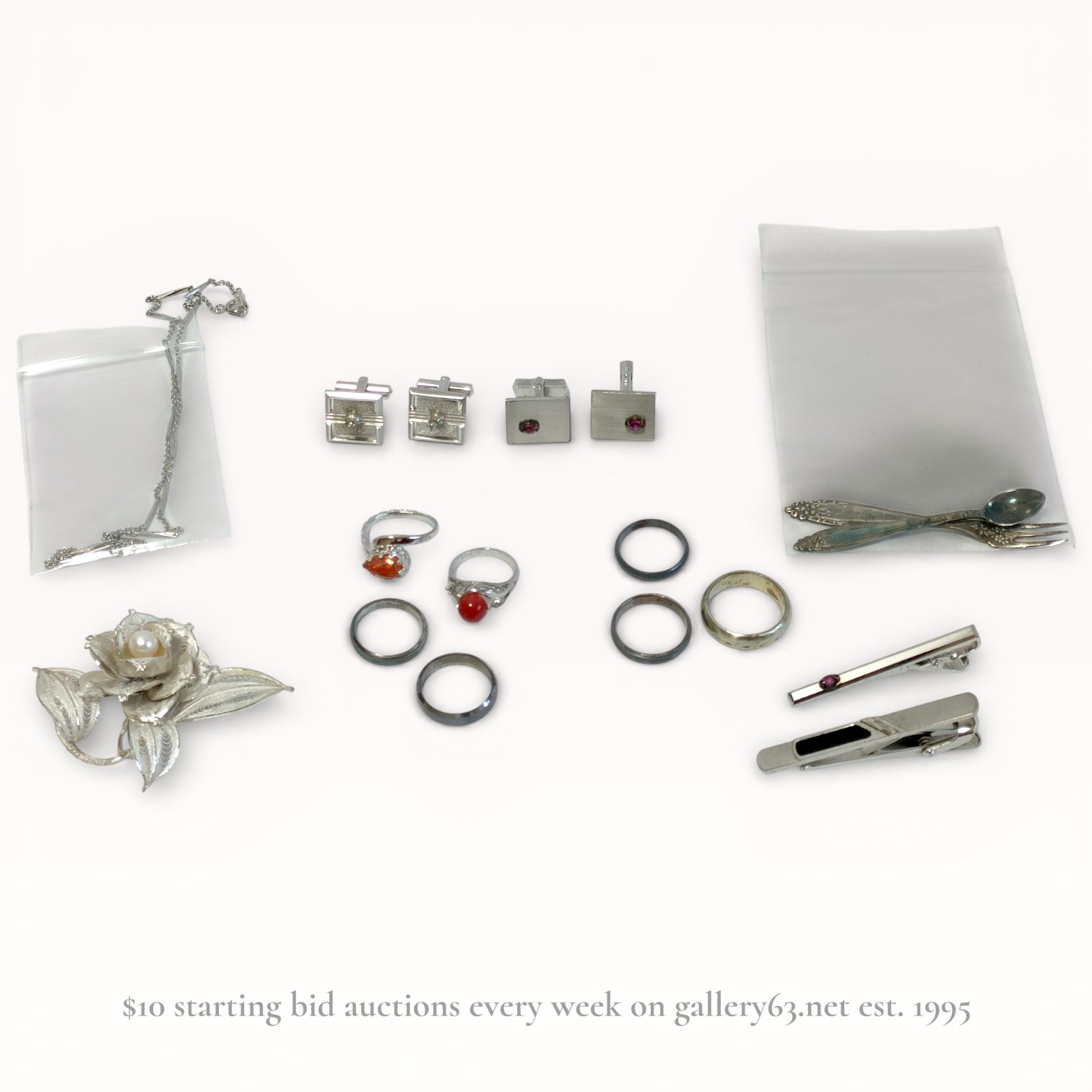 An Assortment of Silver and Silver-Toned Jewelry and Accessories