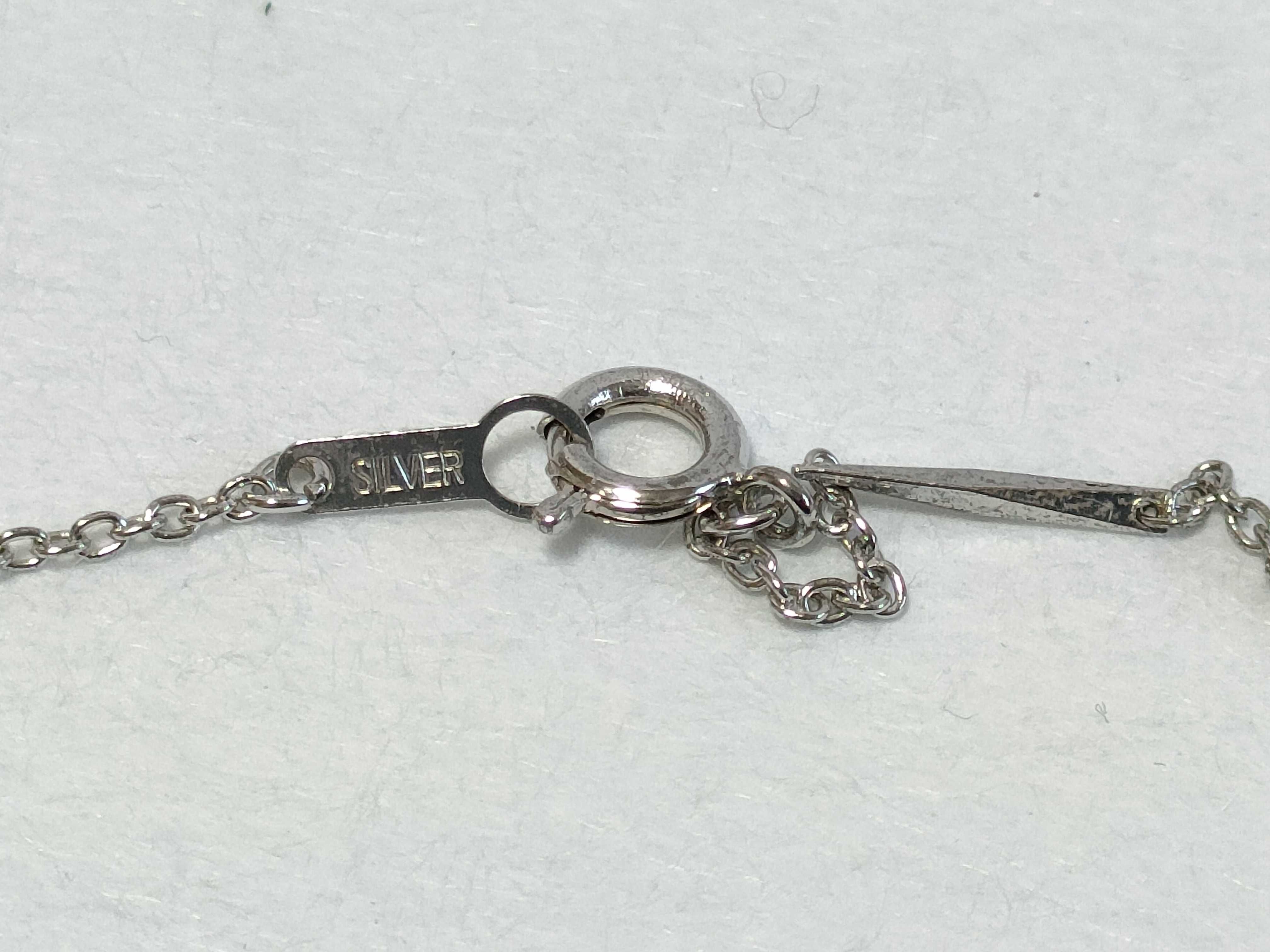 An Assortment of Silver and Silver-Toned Jewelry and Accessories