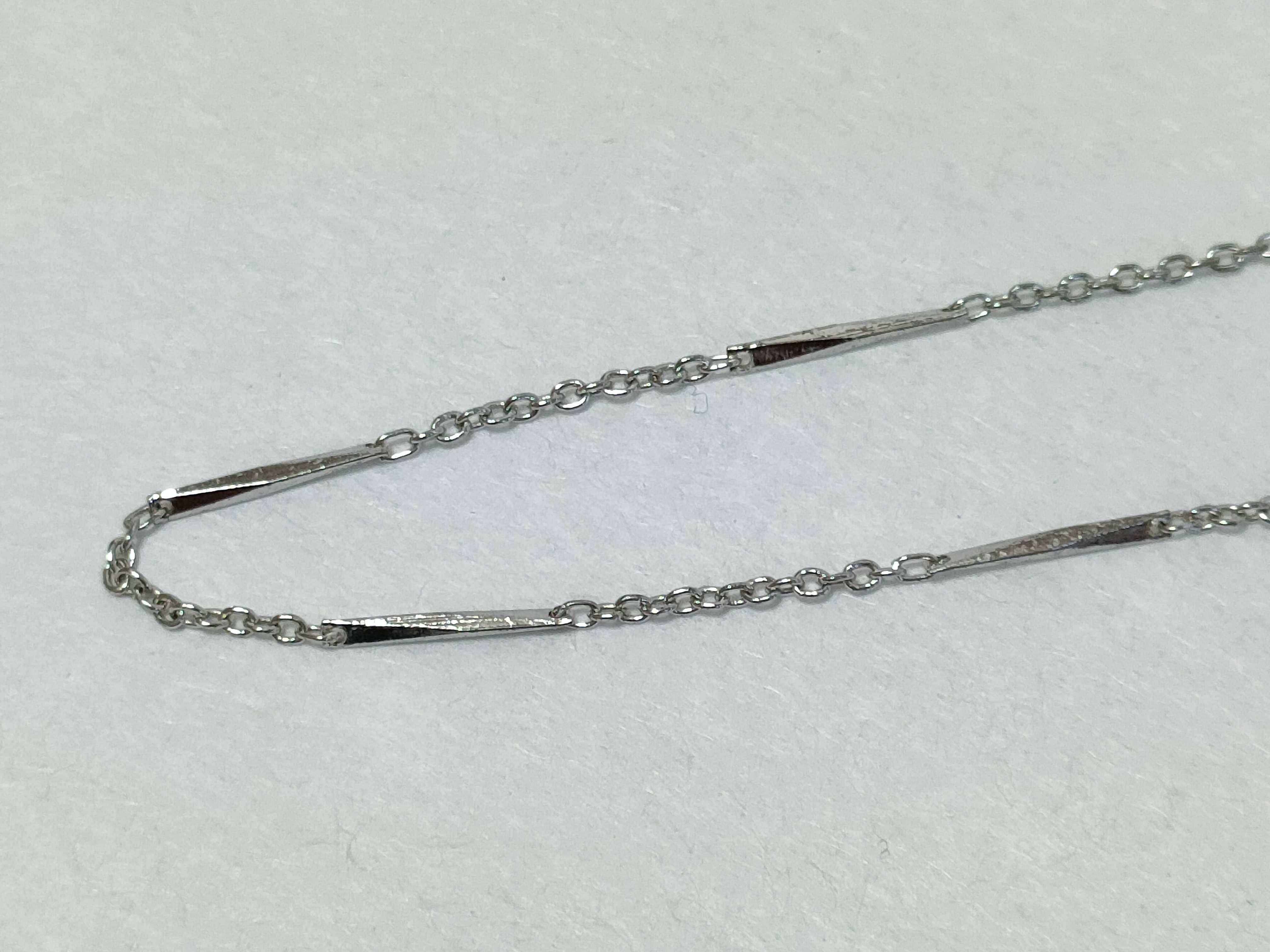 An Assortment of Silver and Silver-Toned Jewelry and Accessories