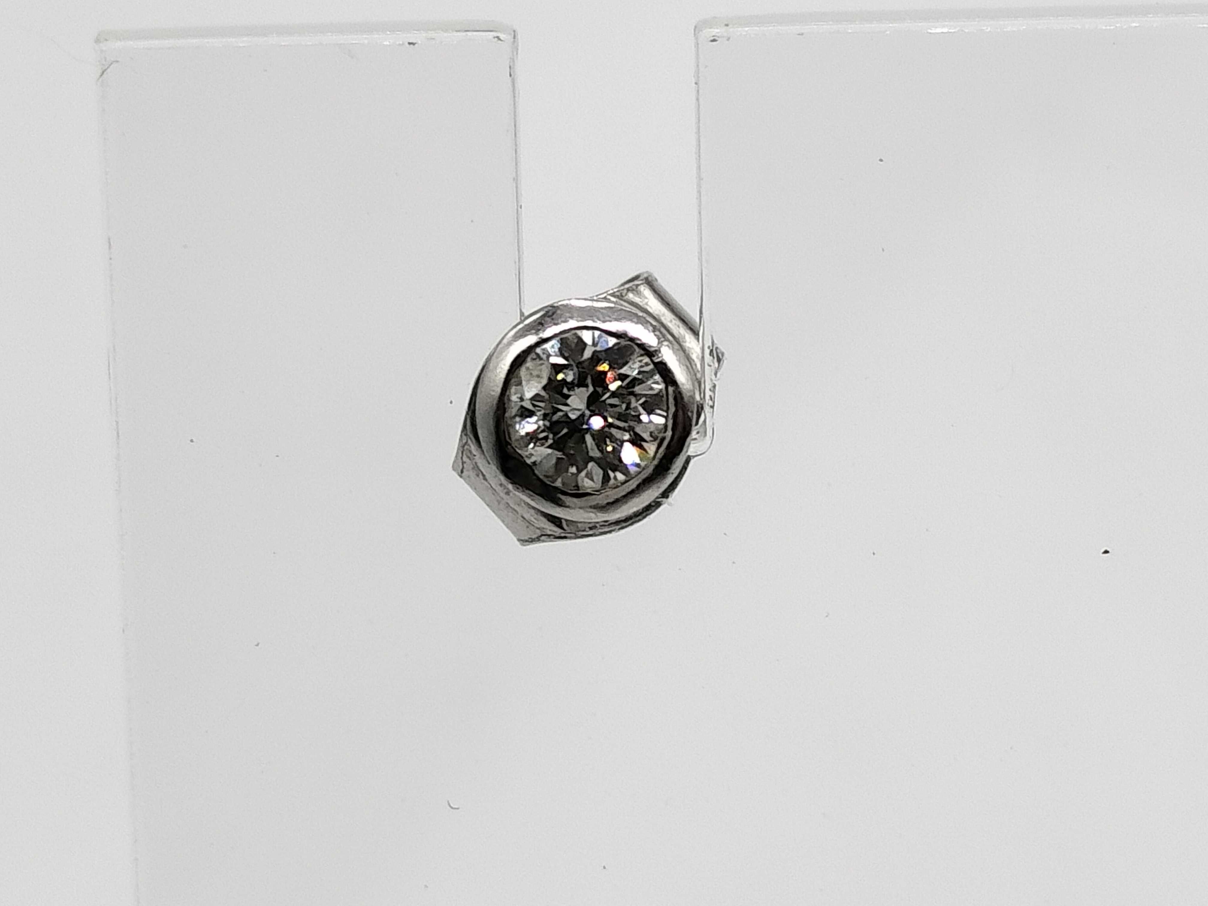 Single Platinum and Bezel Set Diamond Stud Earring