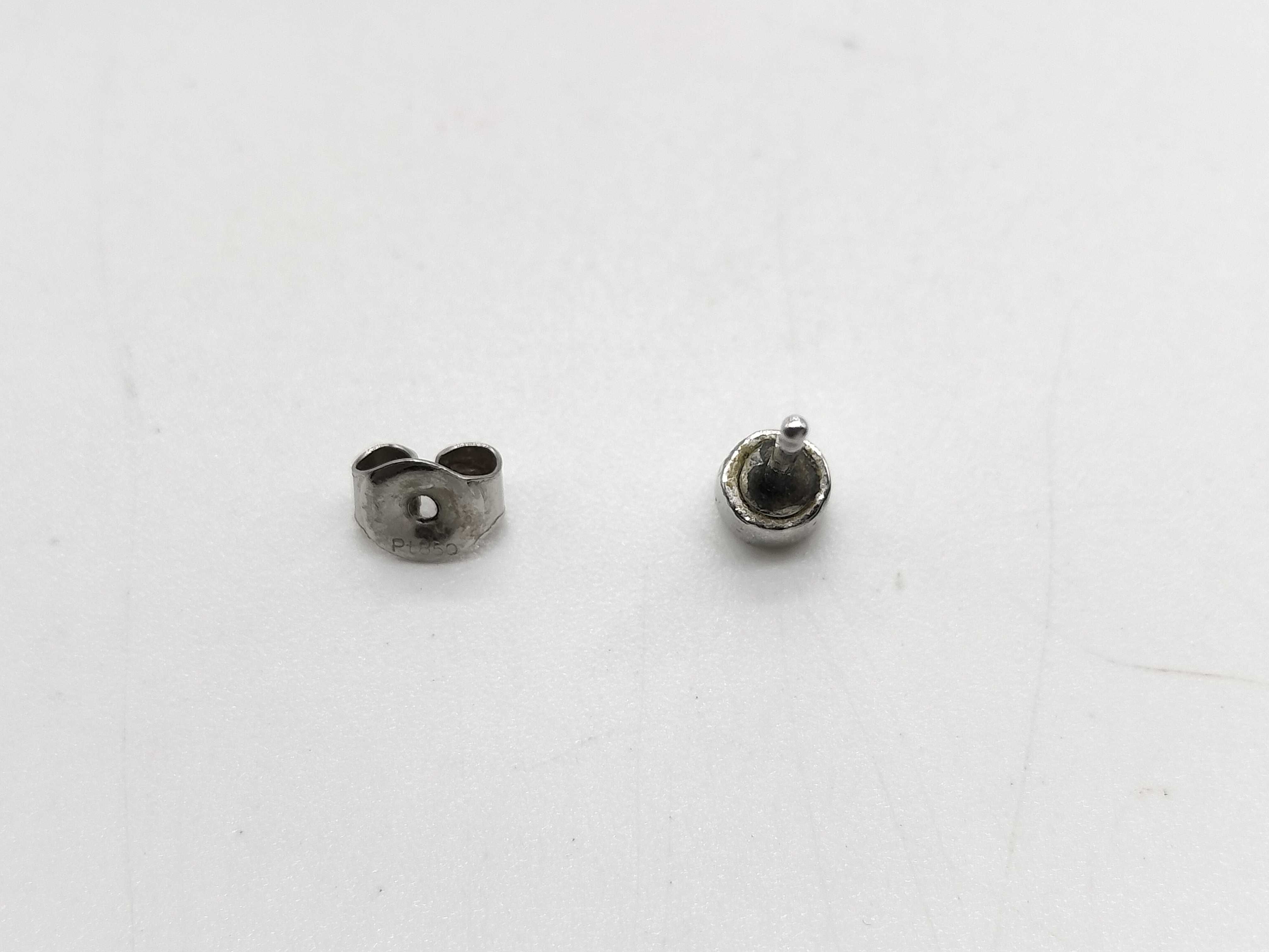Single Platinum and Bezel Set Diamond Stud Earring