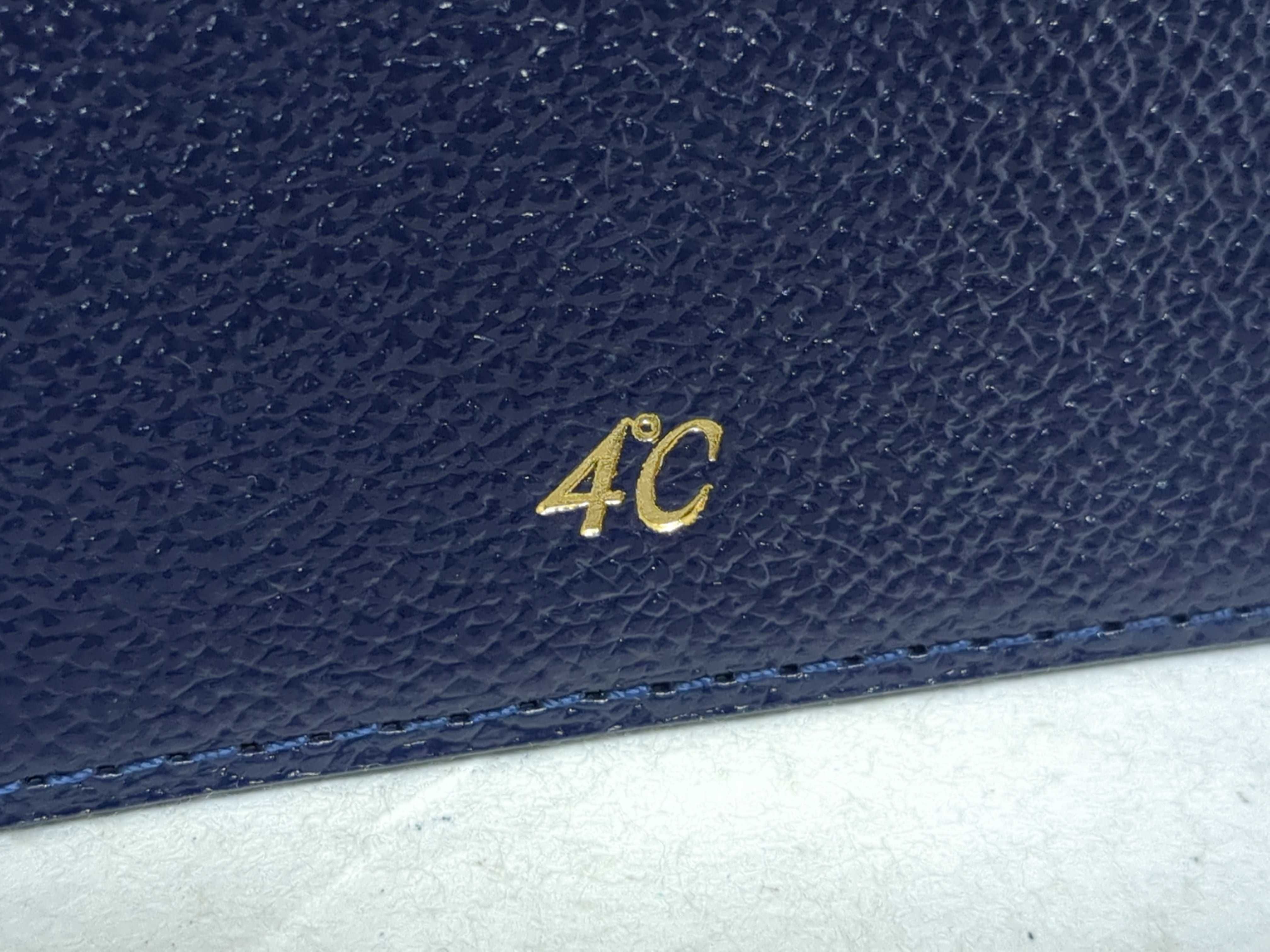 A Group of Designer Personal Accessories Including Coach Keychains and a 4C Card Holder w/Box