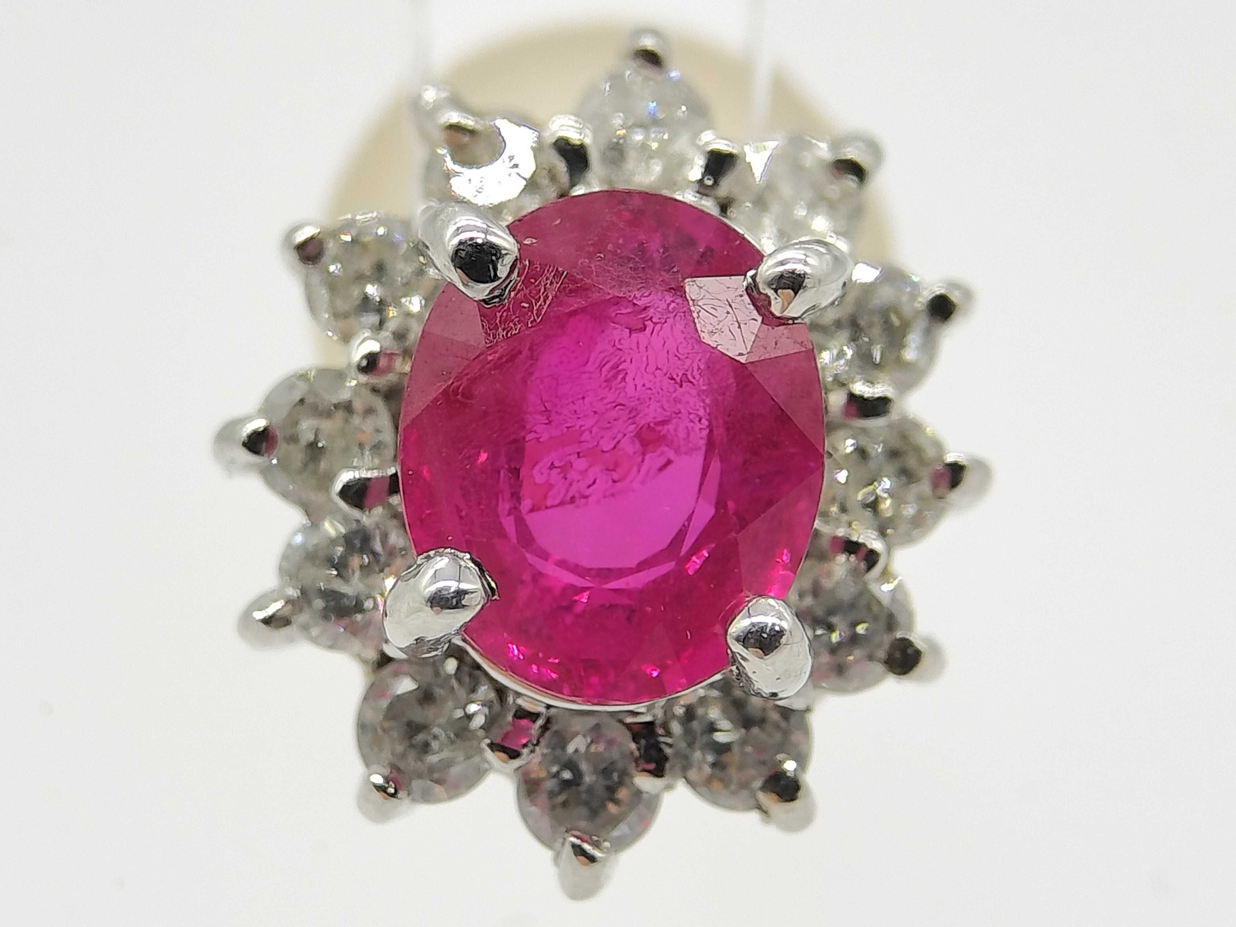 A Pair of Ruby and Diamond Cluster Stud Earrings in 18K White Gold