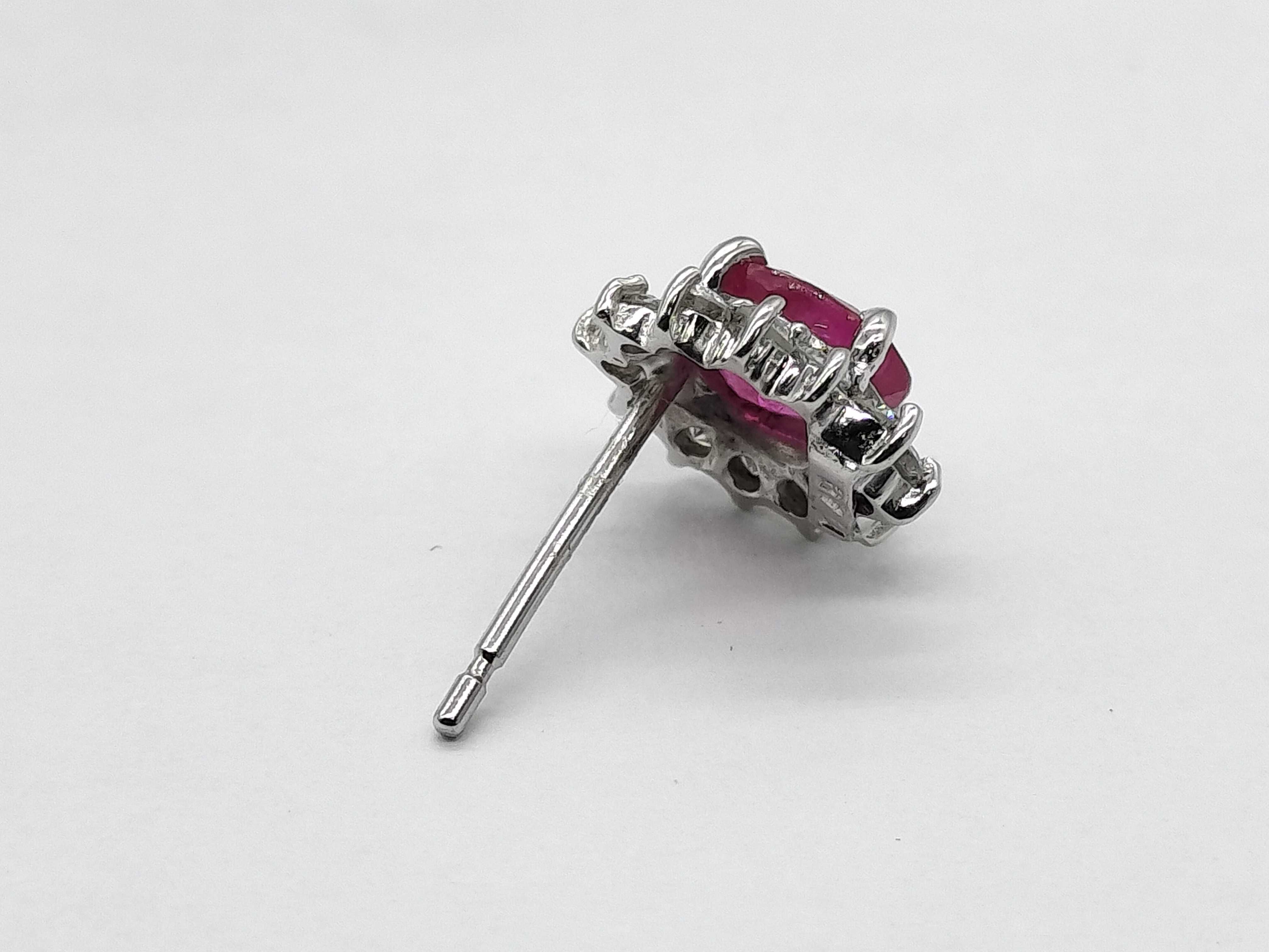 A Pair of Ruby and Diamond Cluster Stud Earrings in 18K White Gold