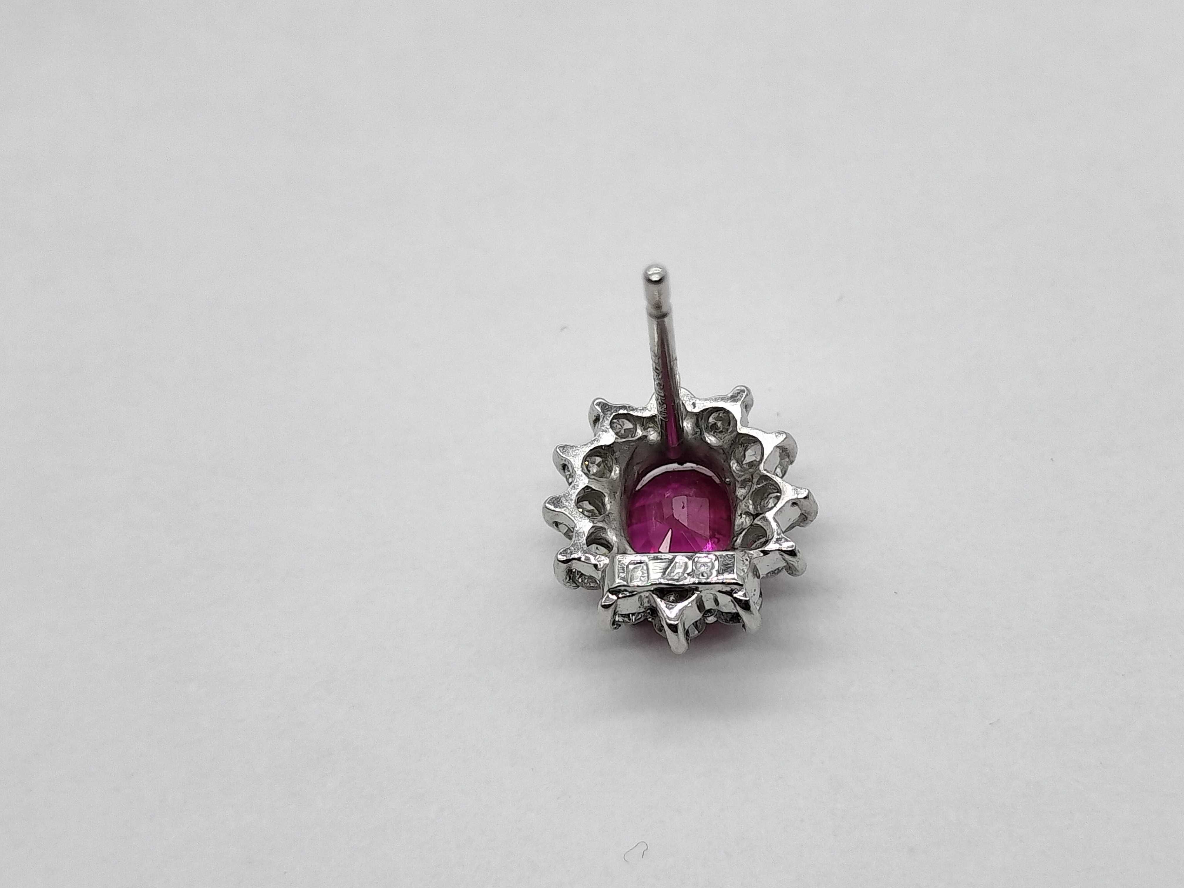 A Pair of Ruby and Diamond Cluster Stud Earrings in 18K White Gold