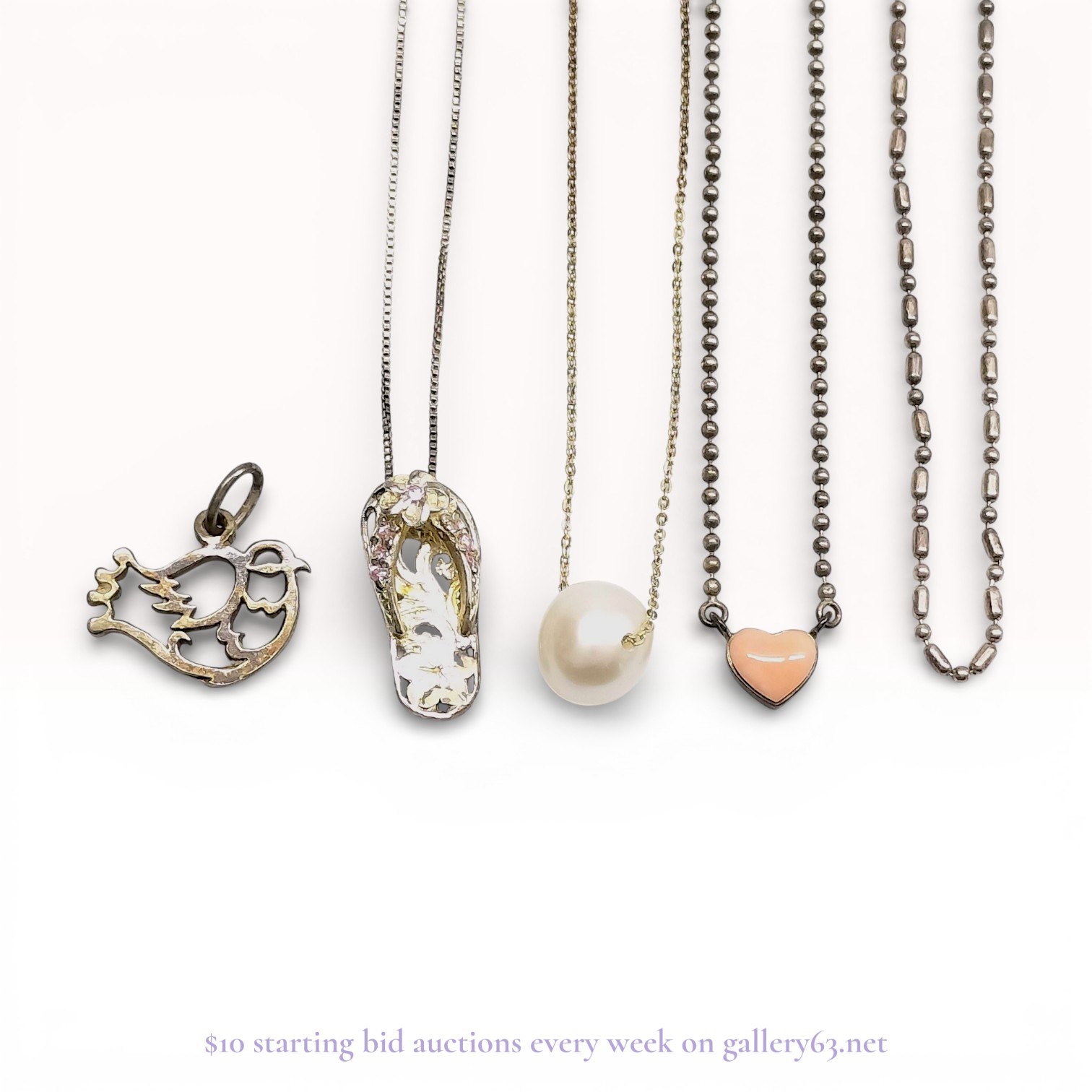 A Group of Sterling Silver and Vermeil Jewelry Including Pearl and Heart Pendants