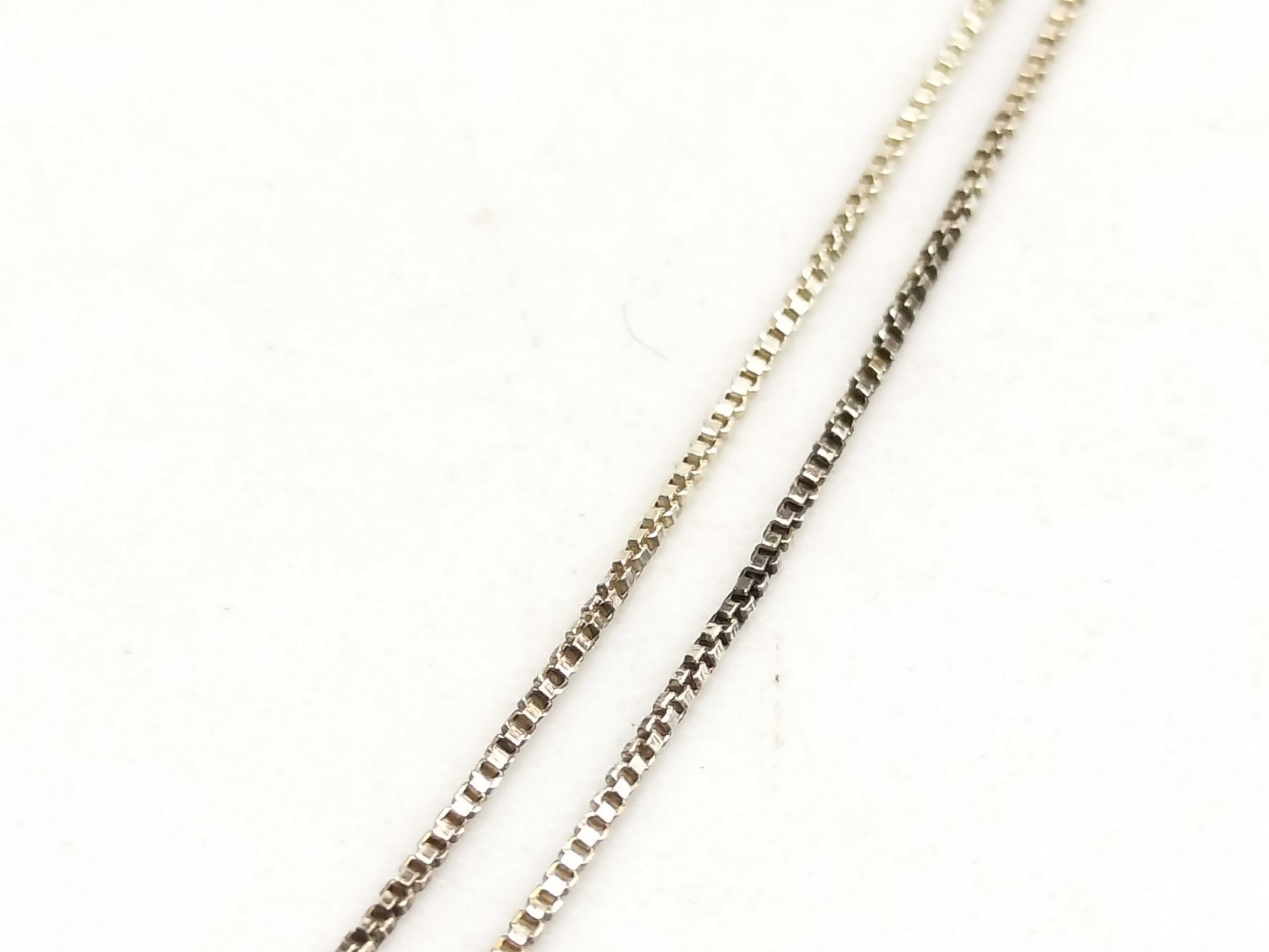 A Group of Sterling Silver and Vermeil Jewelry Including Pearl and Heart Pendants