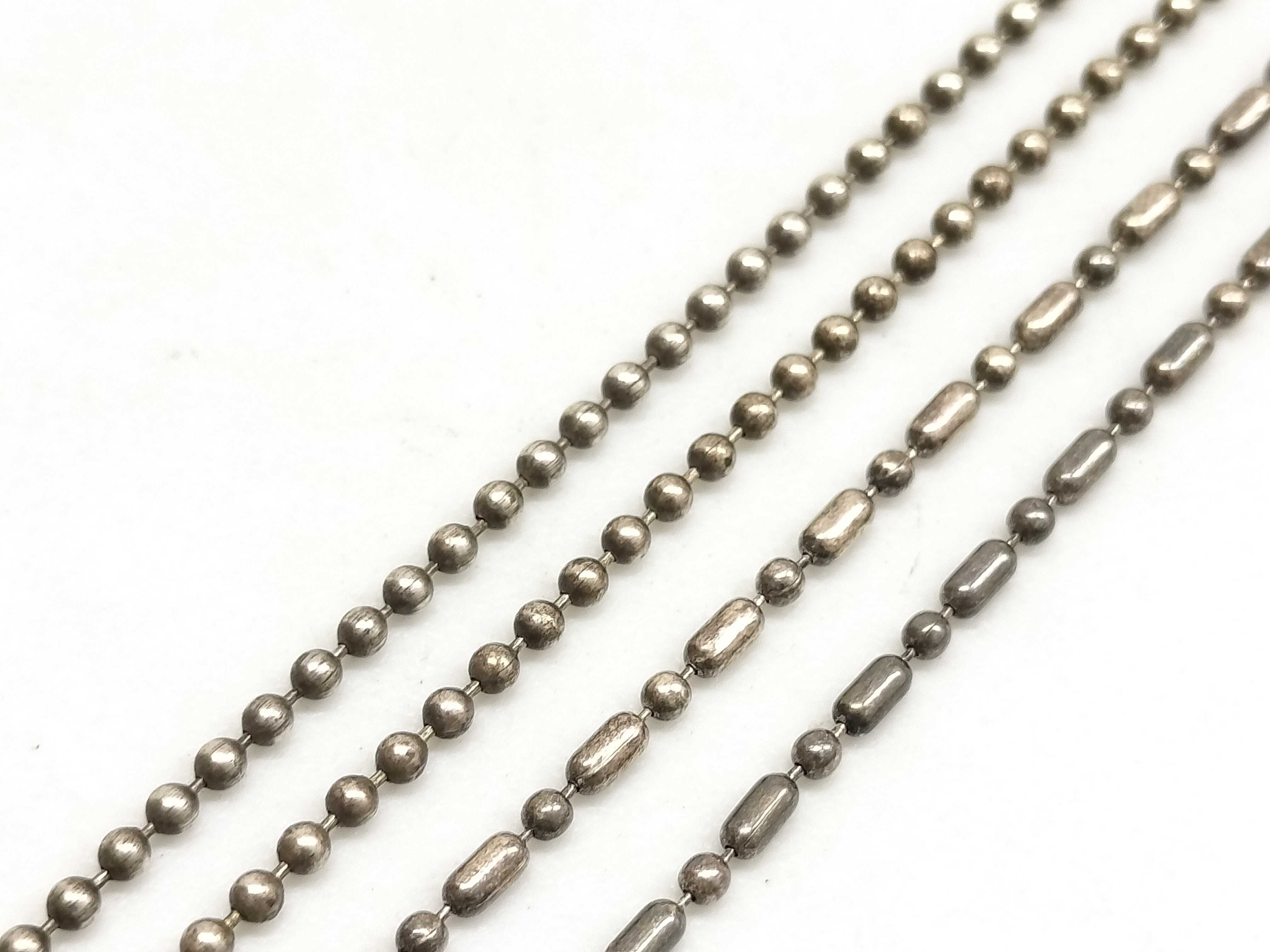 A Group of Sterling Silver and Vermeil Jewelry Including Pearl and Heart Pendants