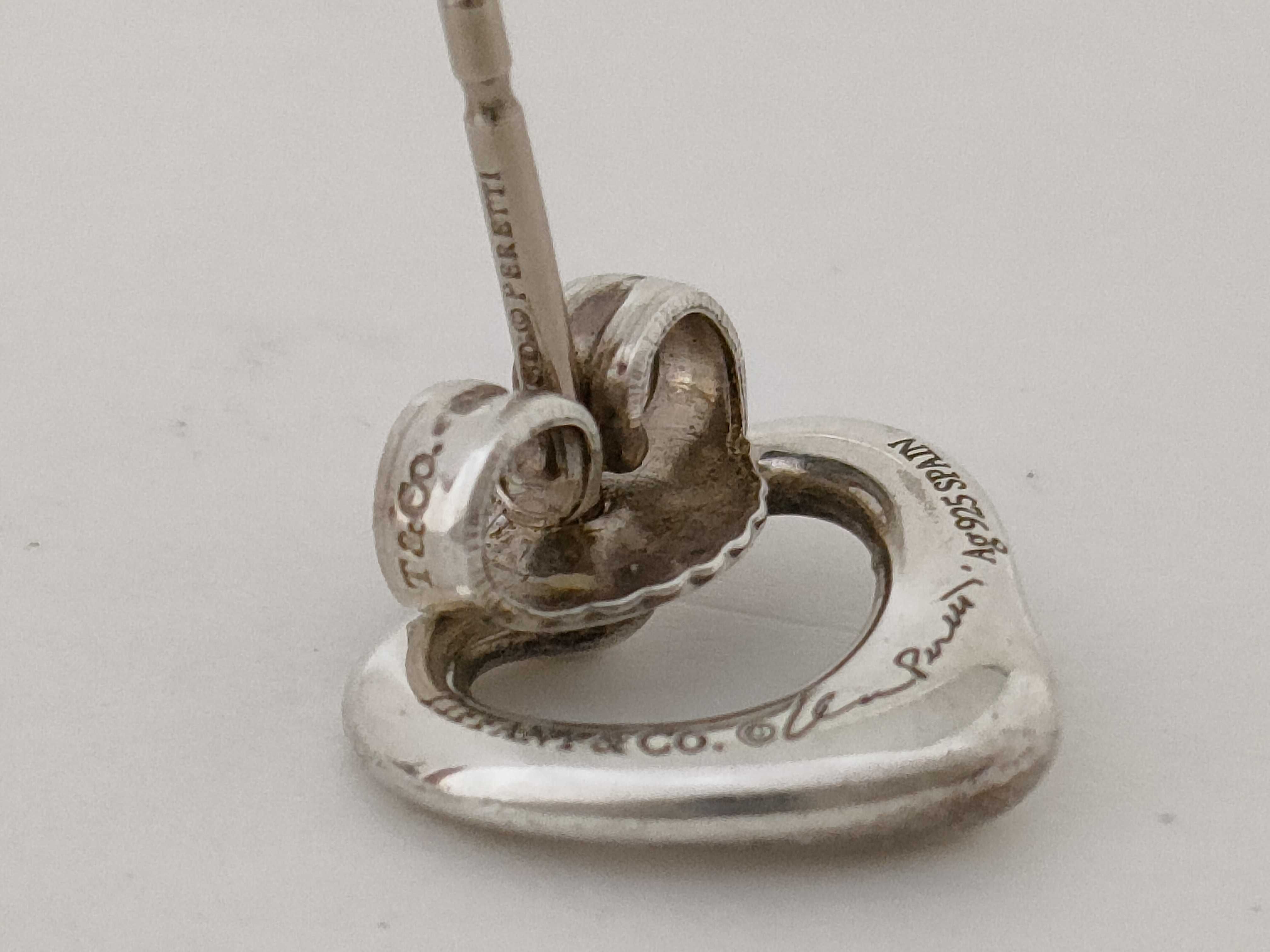 A Pair of Tiffany and Co. Elsa Peretti Sterling Silver Open Heart Stud Earrings