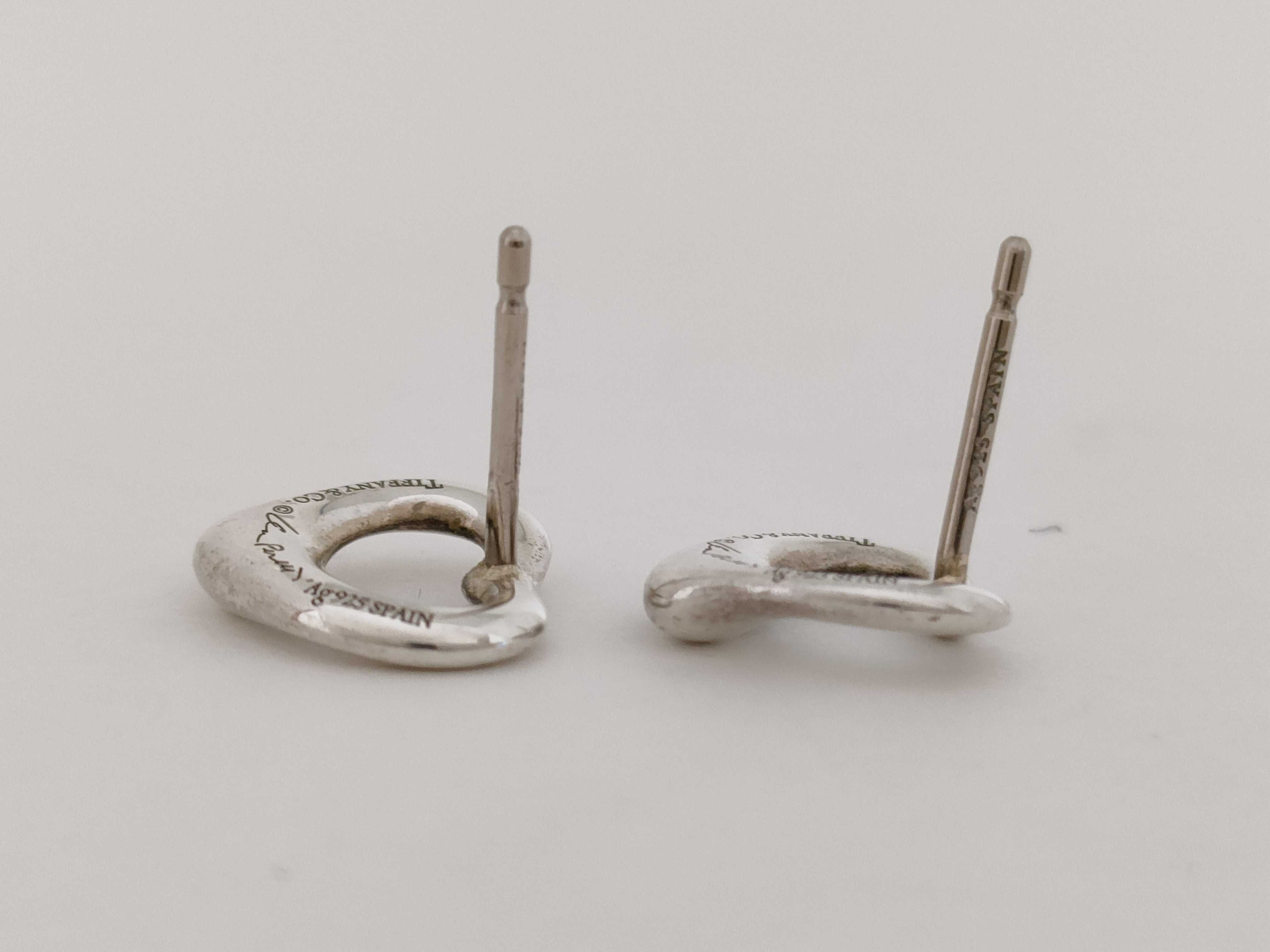 A Pair of Tiffany and Co. Elsa Peretti Sterling Silver Open Heart Stud Earrings