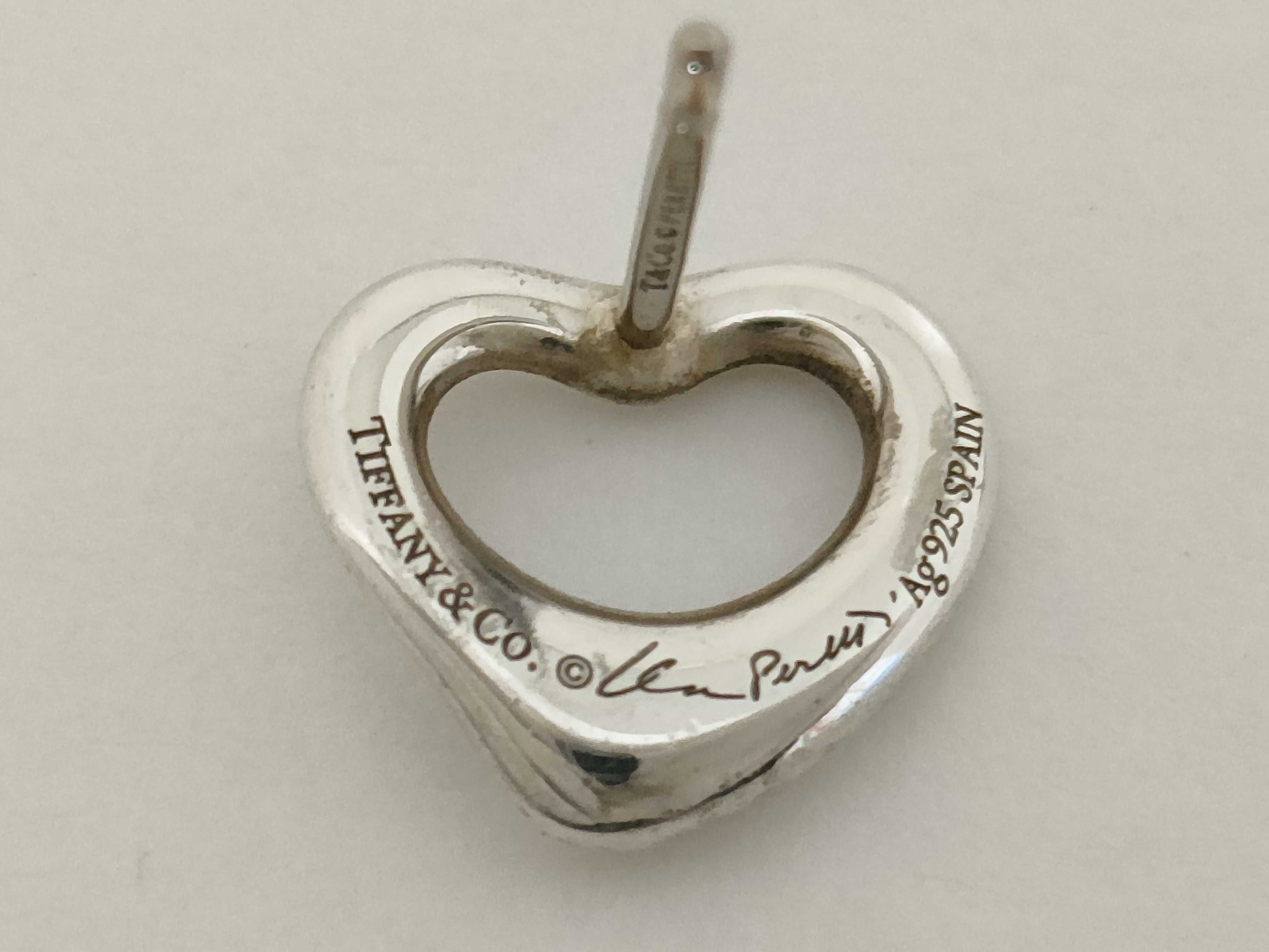 A Pair of Tiffany and Co. Elsa Peretti Sterling Silver Open Heart Stud Earrings
