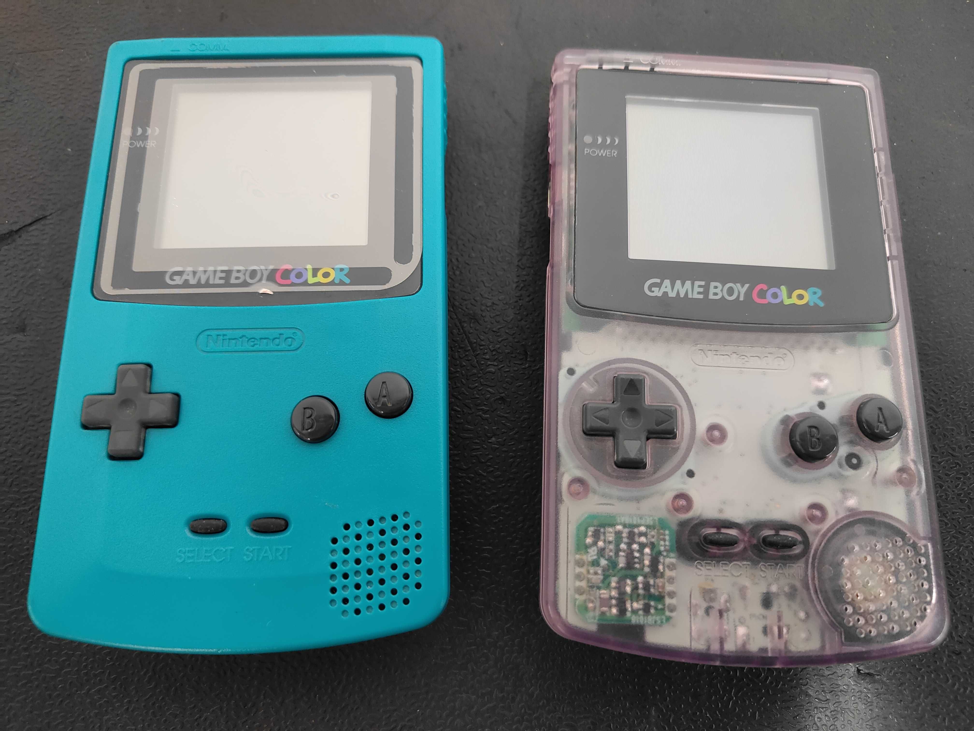 A Collection of Nintendo Game Boy Color Handheld Consoles and Japanese Software