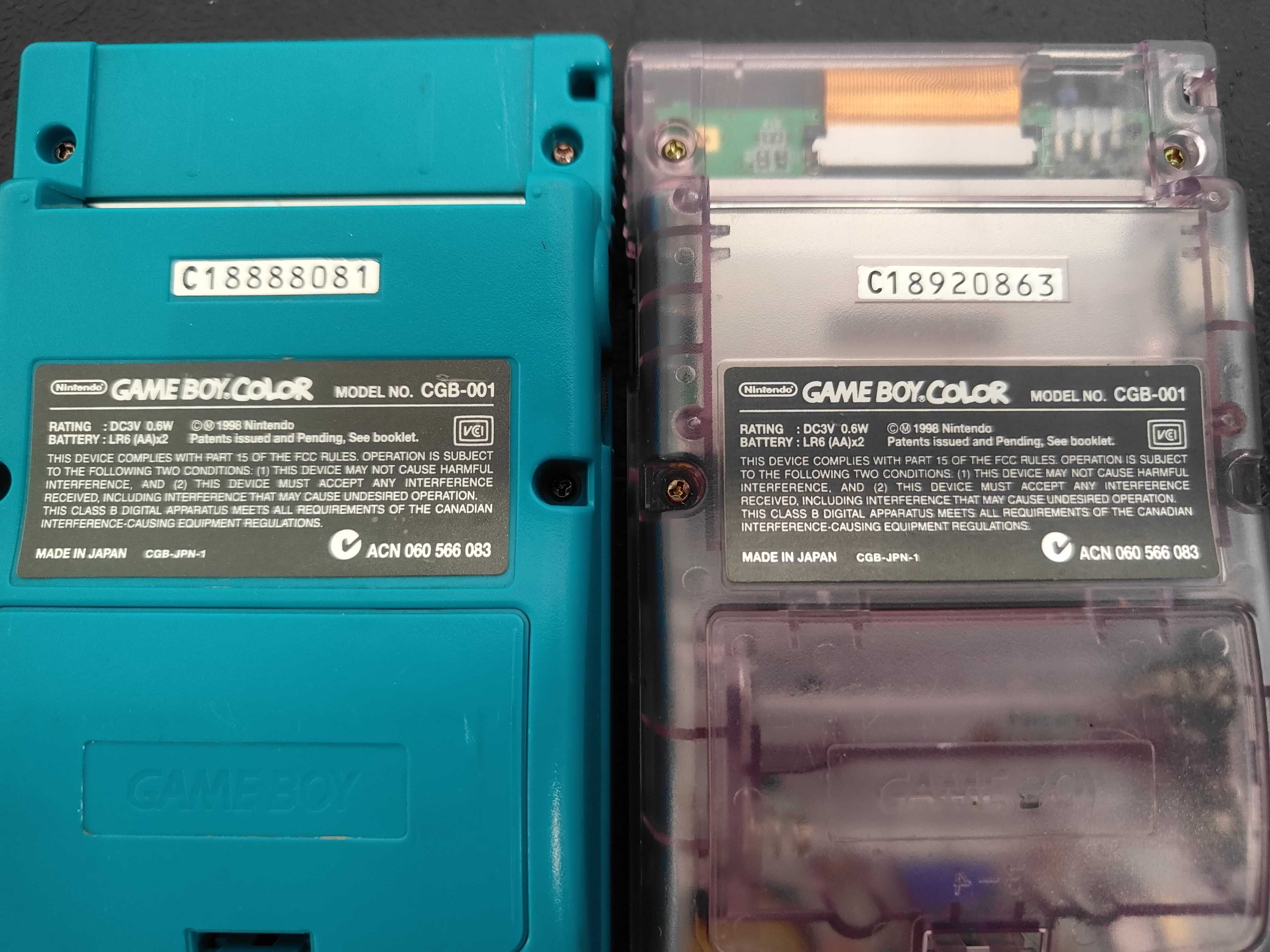 A Collection of Nintendo Game Boy Color Handheld Consoles and Japanese Software