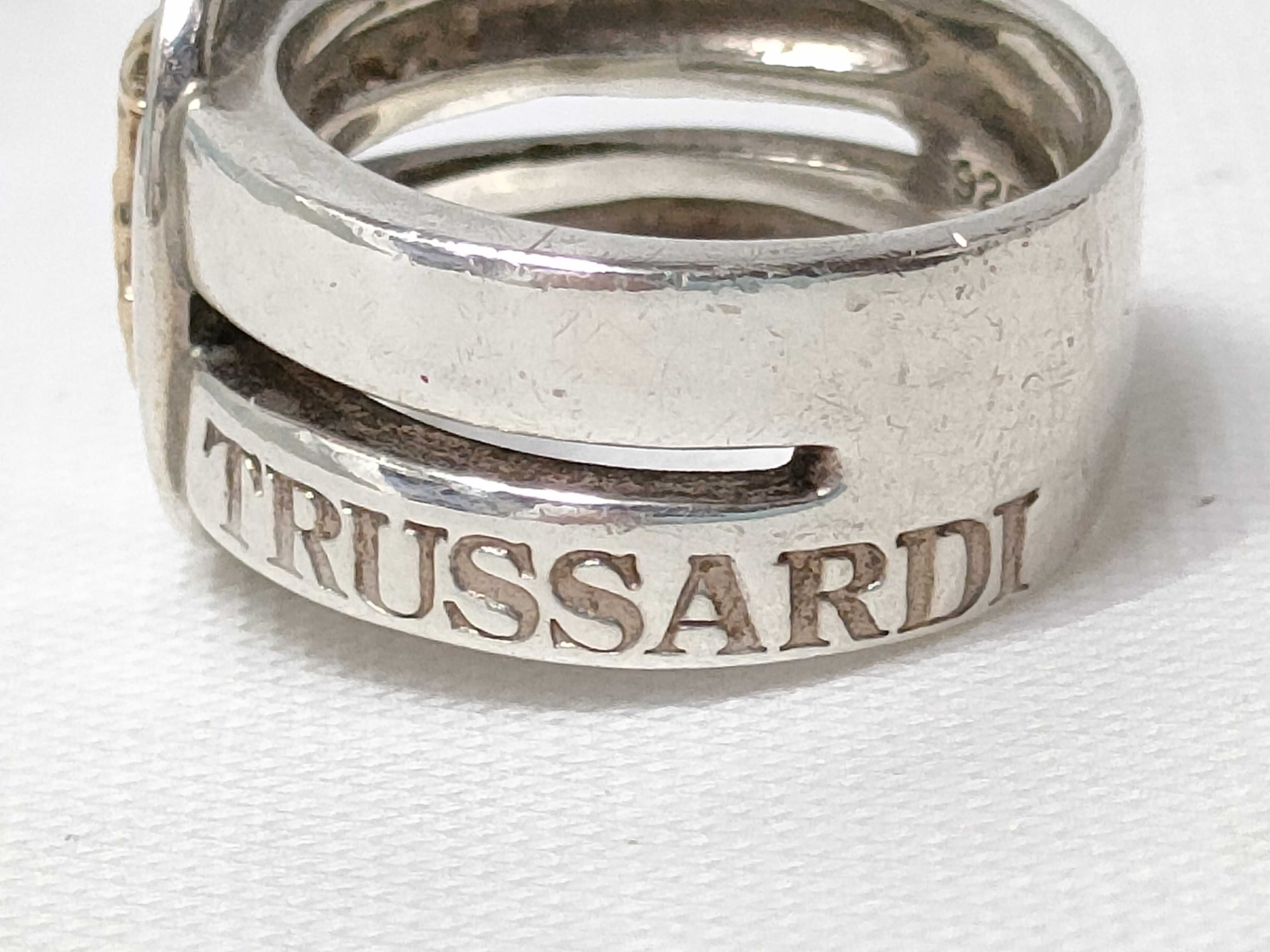 Four Mixed Karat Gold and Sterling Silver Rings