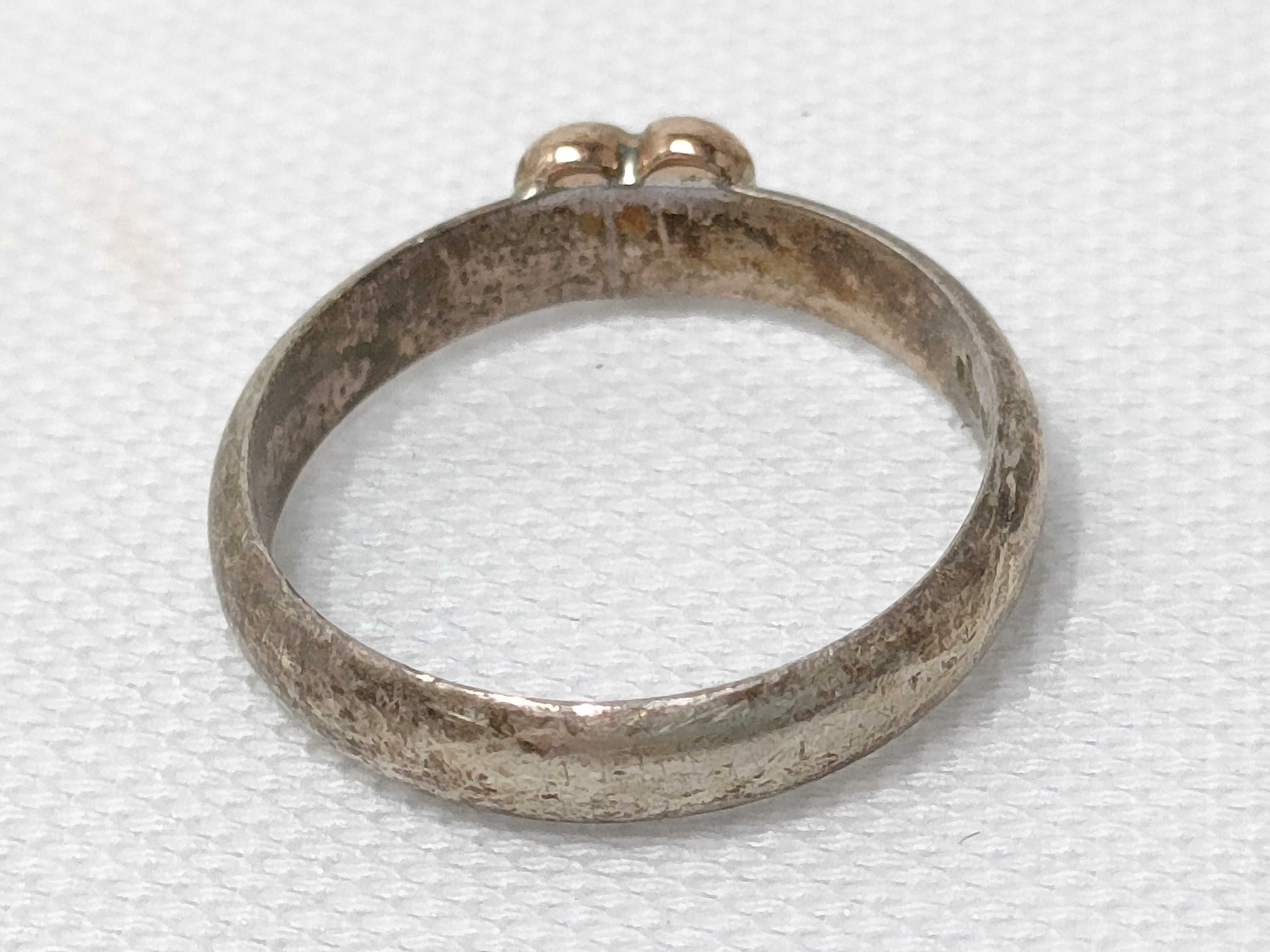 Four Mixed Karat Gold and Sterling Silver Rings