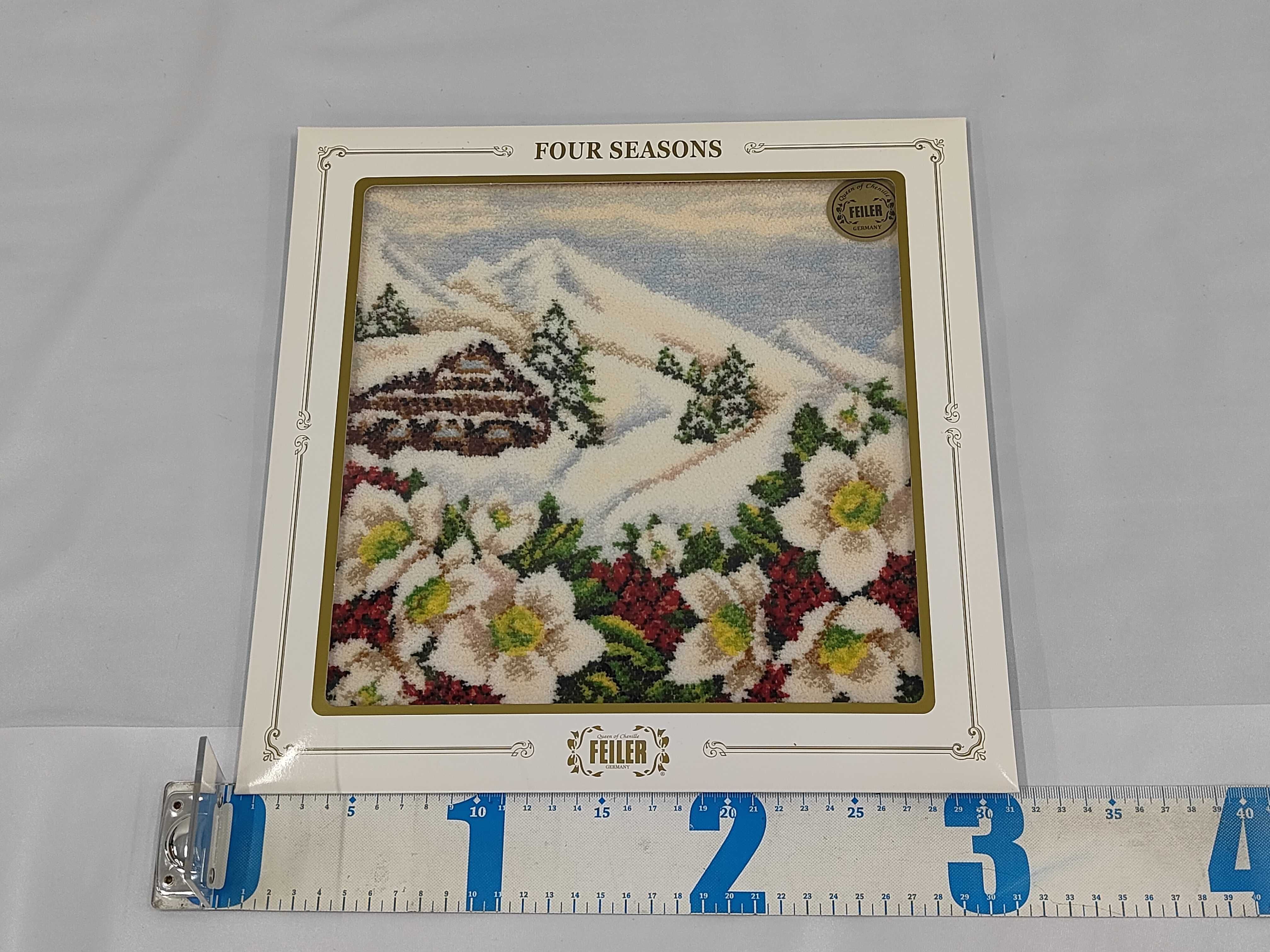 A Set of Four Feiler Germany Four Seasons Series Framed Chenille Textiles